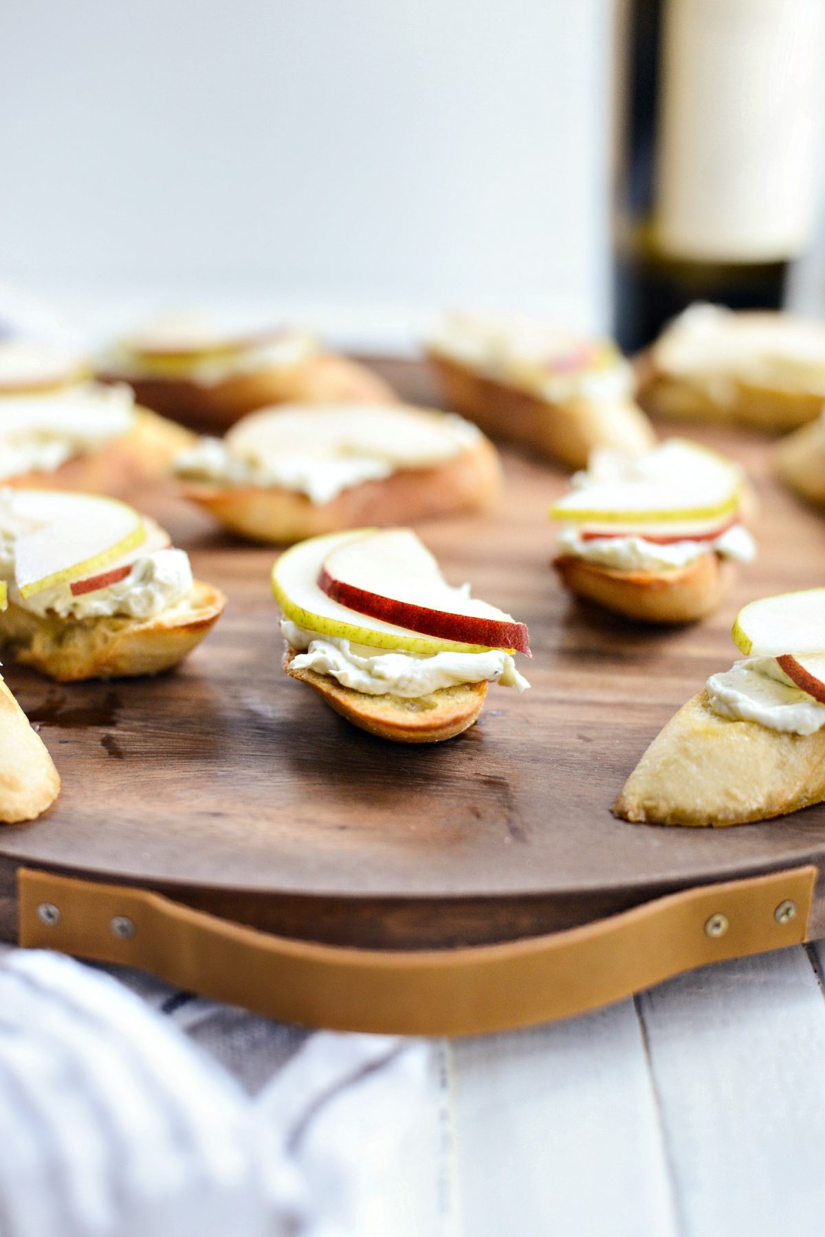 Top crostini with whipped blue cheese and sliced pear.