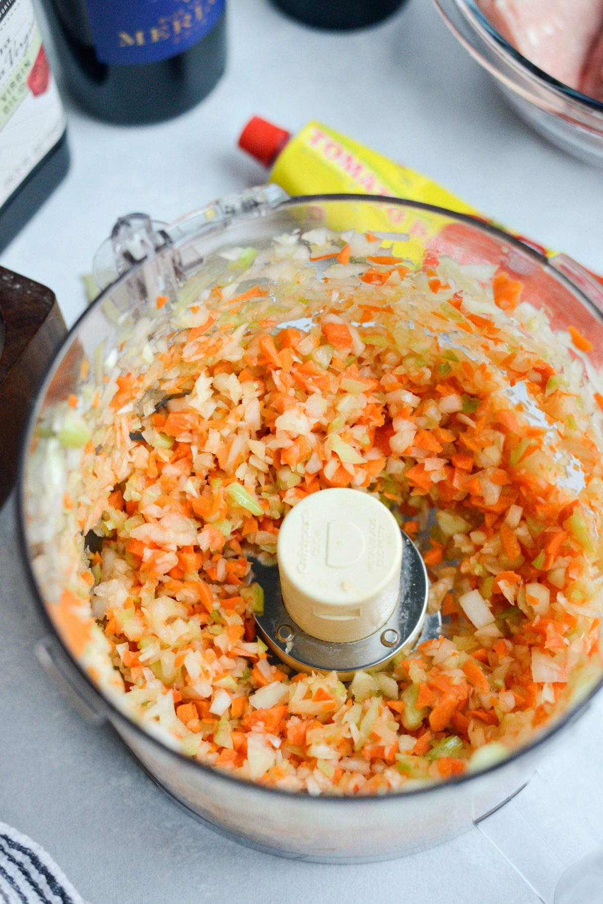 finely chop carrots, celery and onions in a food processor.