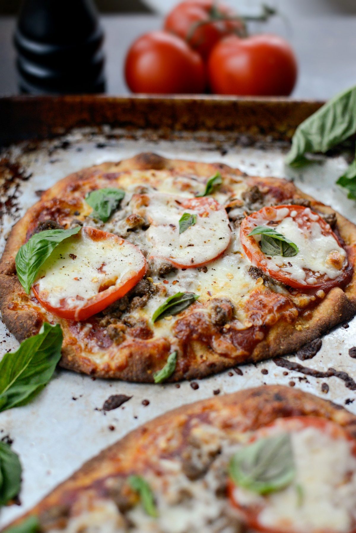 top with red pepper flakes and fresh basil.