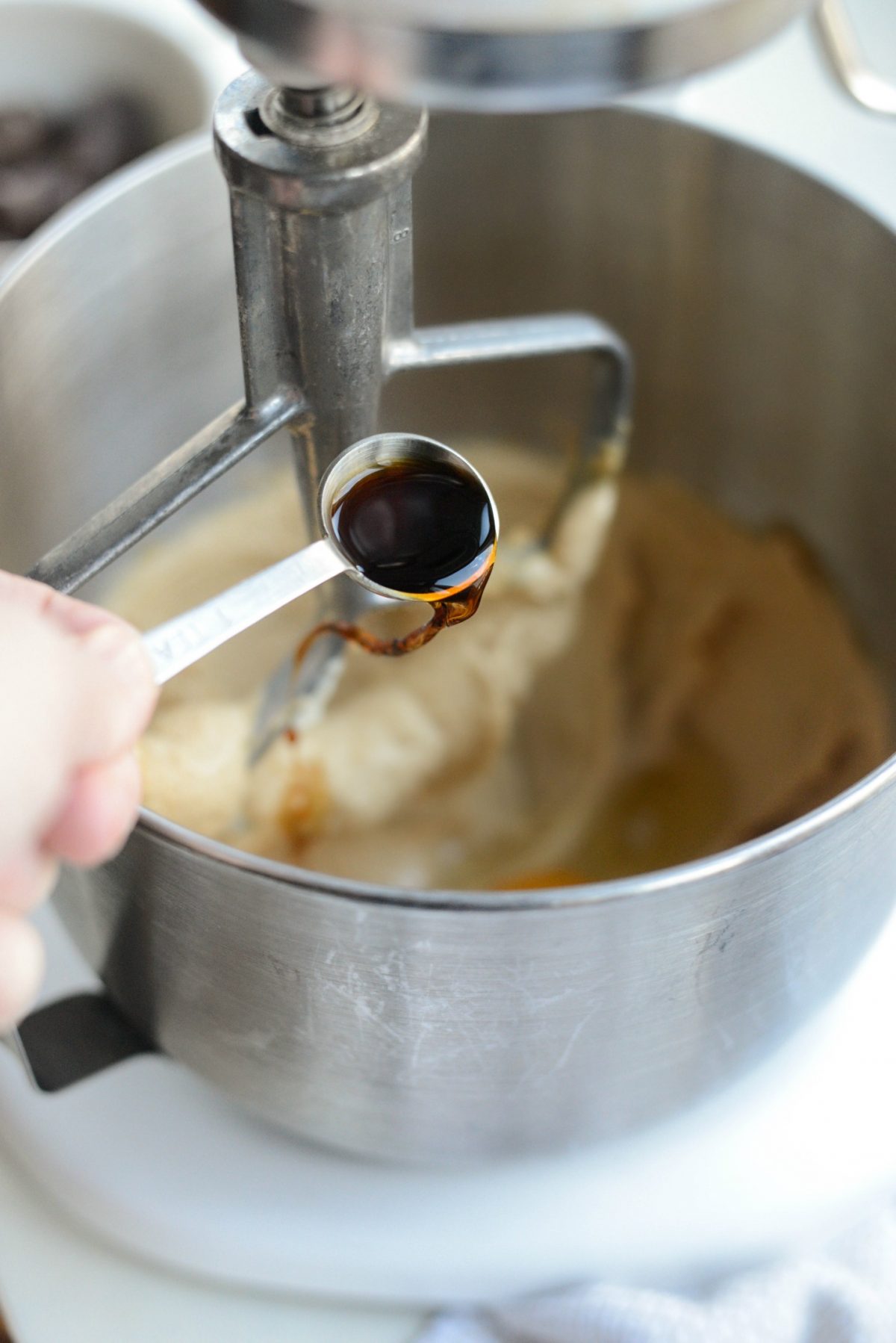 pouring vanilla.