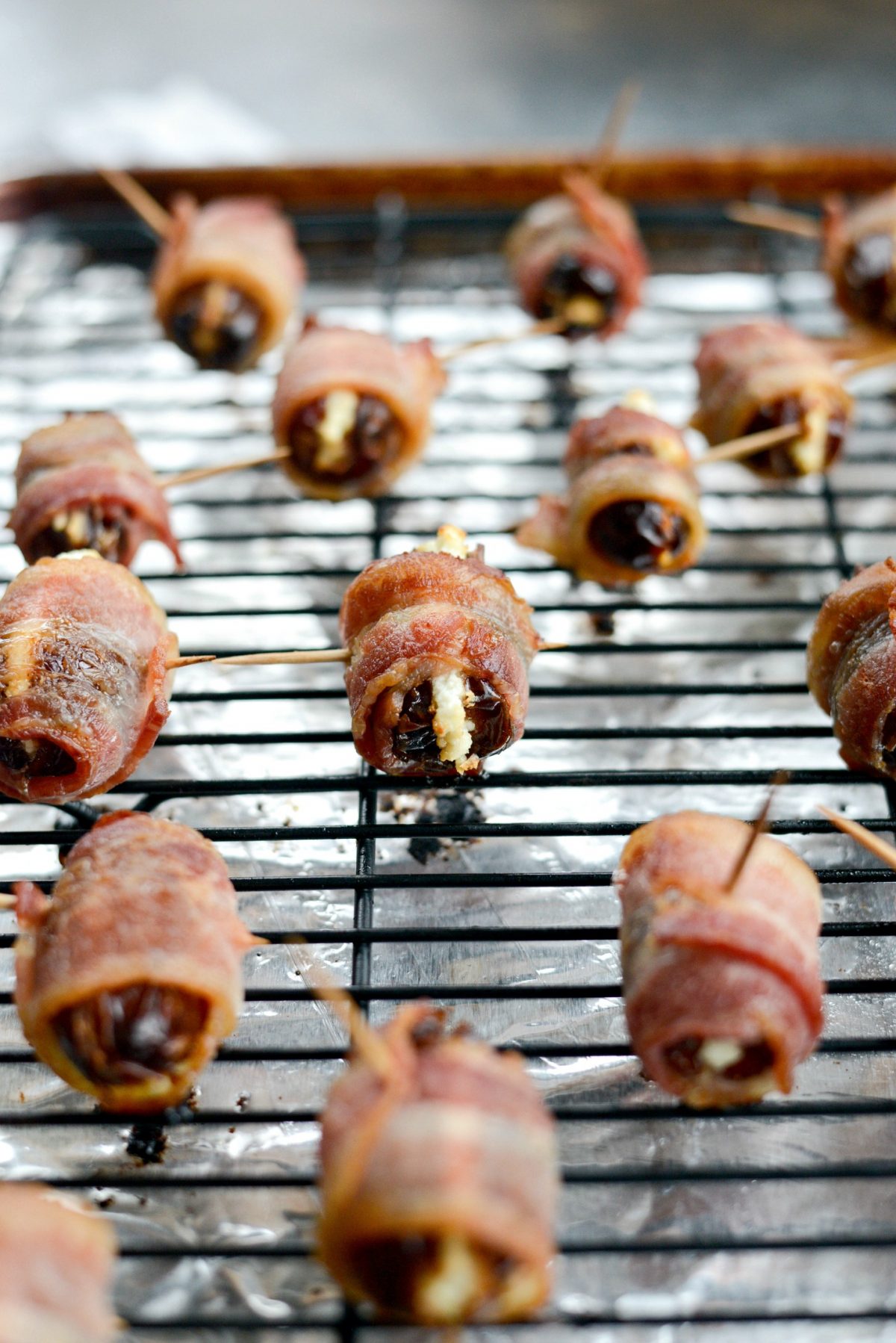 baked Bacon Wrapped Stuffed Dates with Goat Cheese
