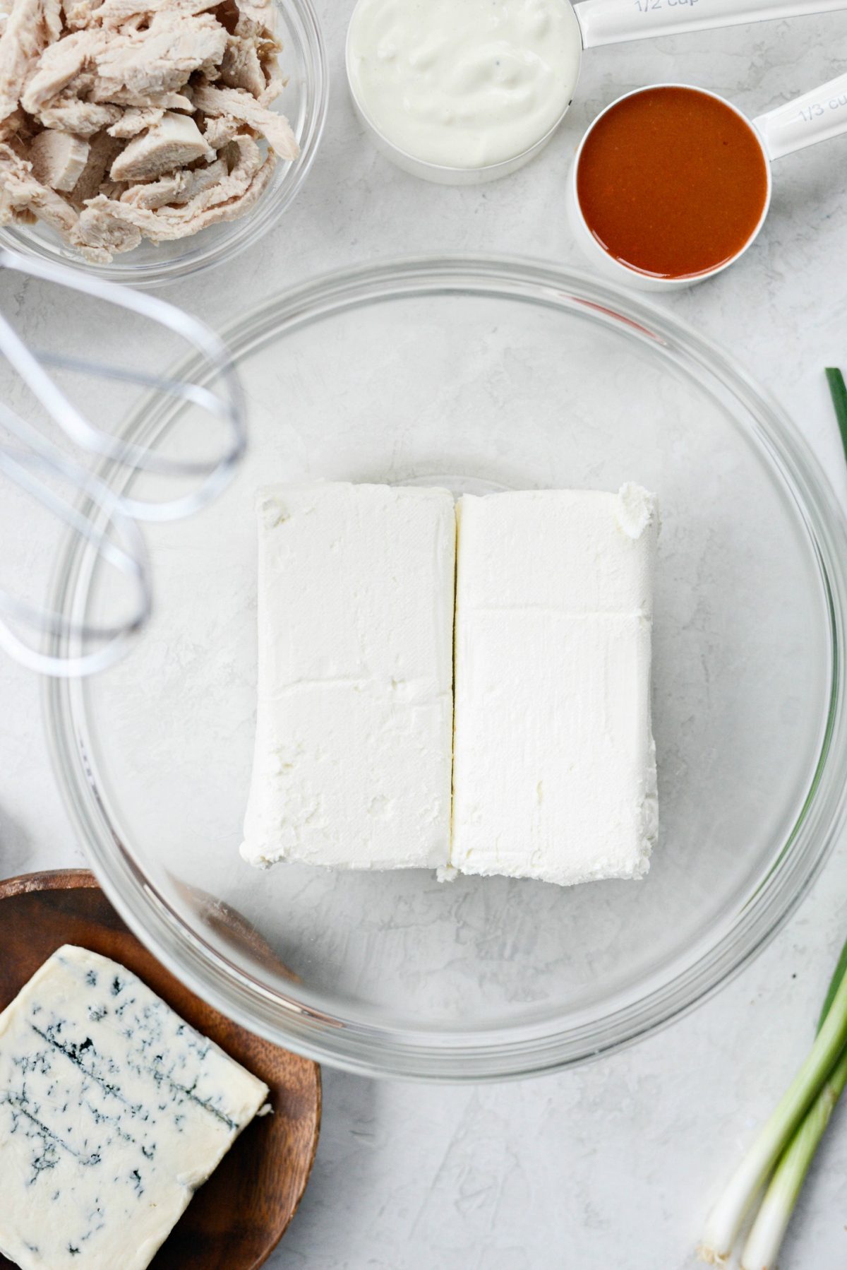 Cream cheese in mixing bowl.