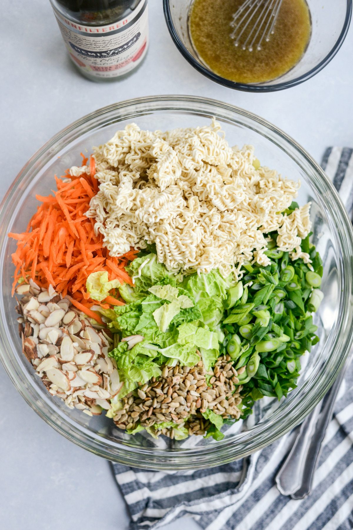 add salad ingredients to a bowl.