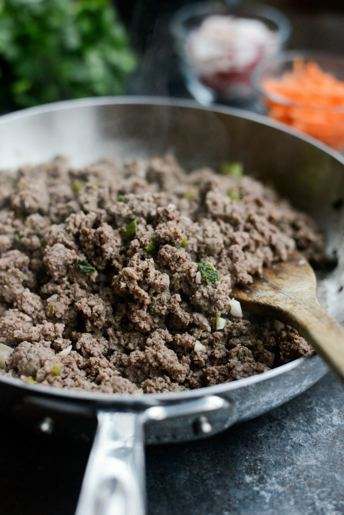 add ground beef and fully cook. Drain fat.