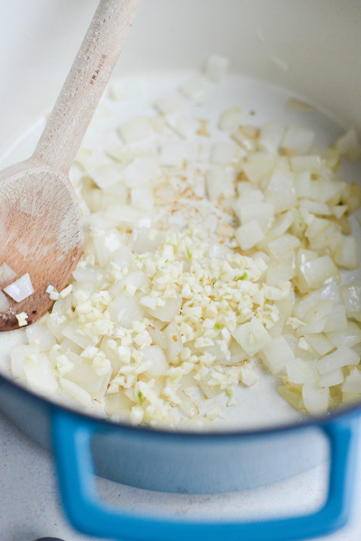 Once softened add in garlic..