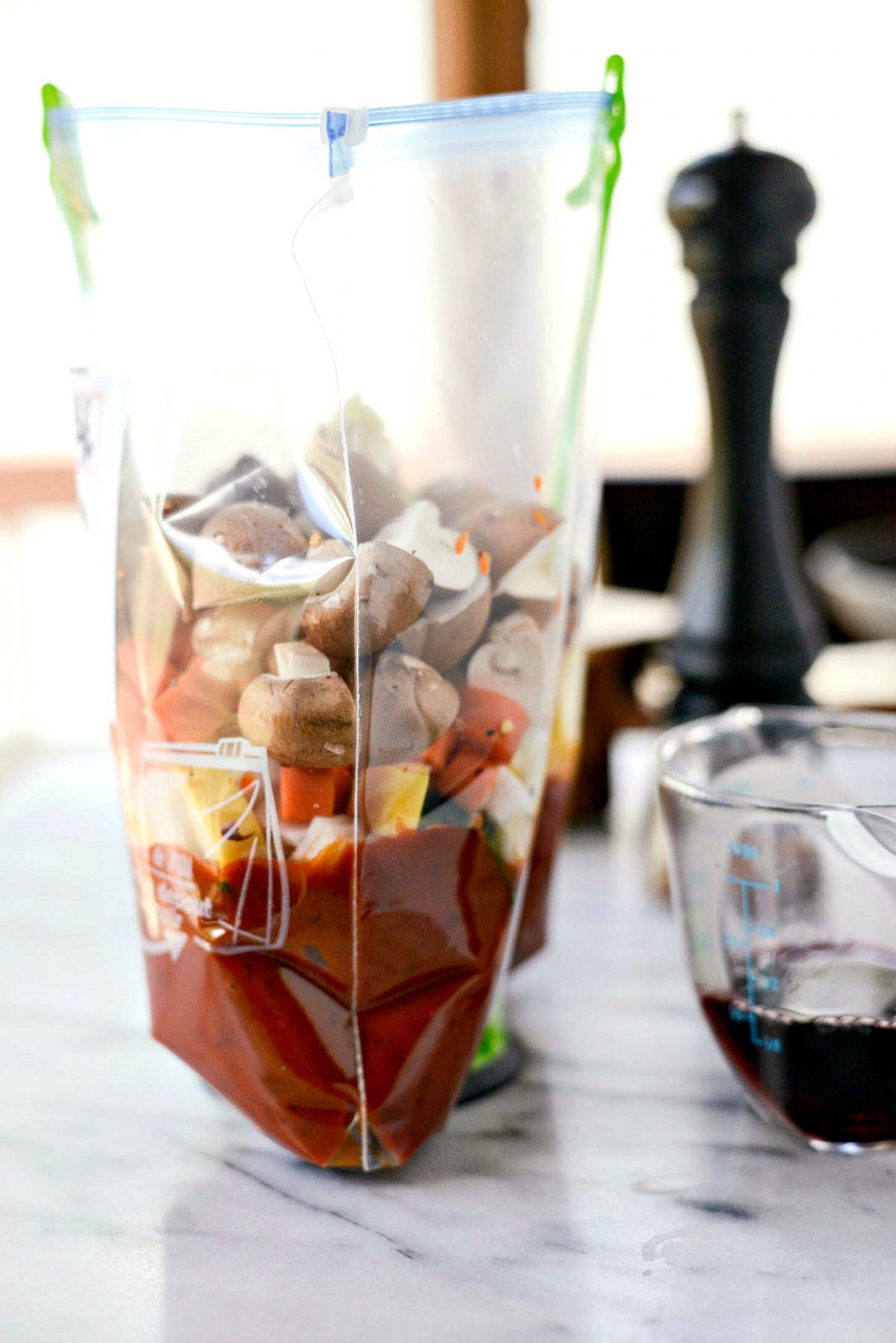 filling bag with prepped ingredients