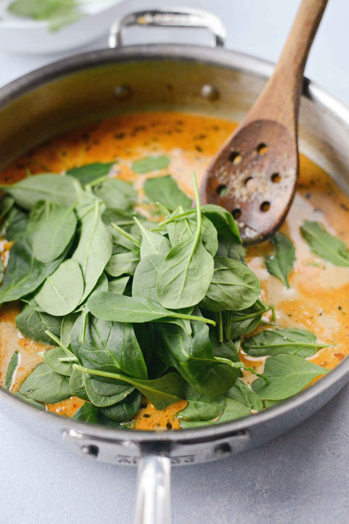 Stir in baby spinach