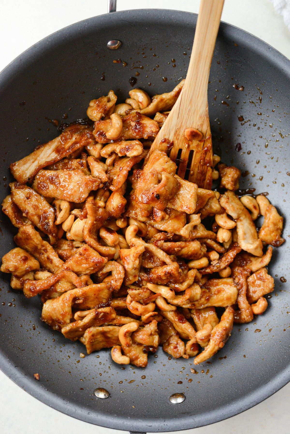 add in pork and cashews and toss to coat.