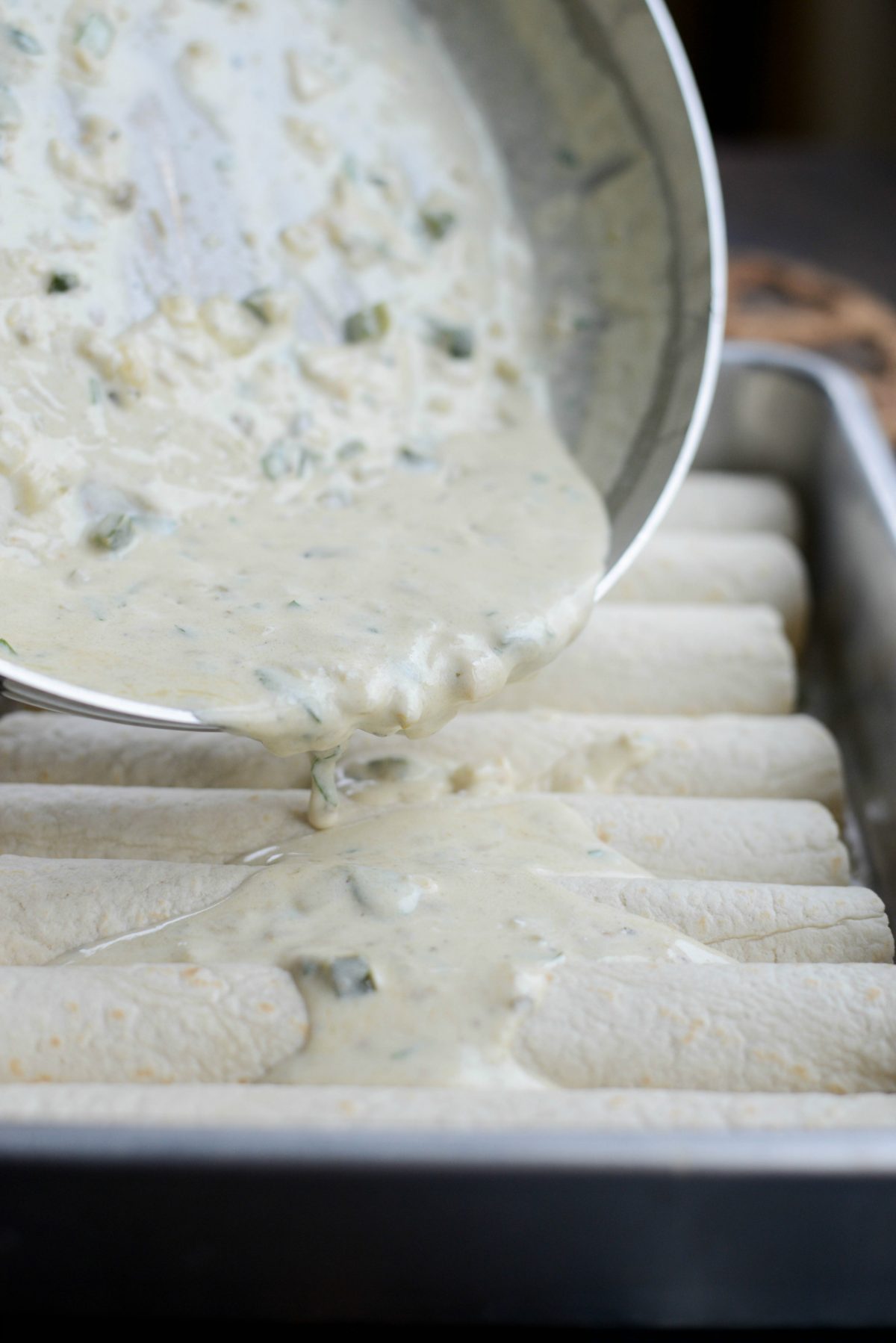 pour remaining sauce over top of the enchiladas