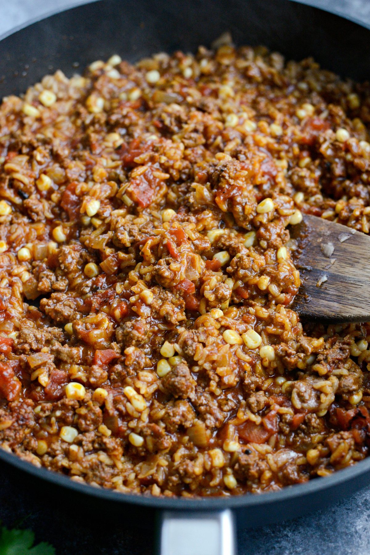 After the 25 minutes, the rice should've absorbed the liquids and be cooked through.