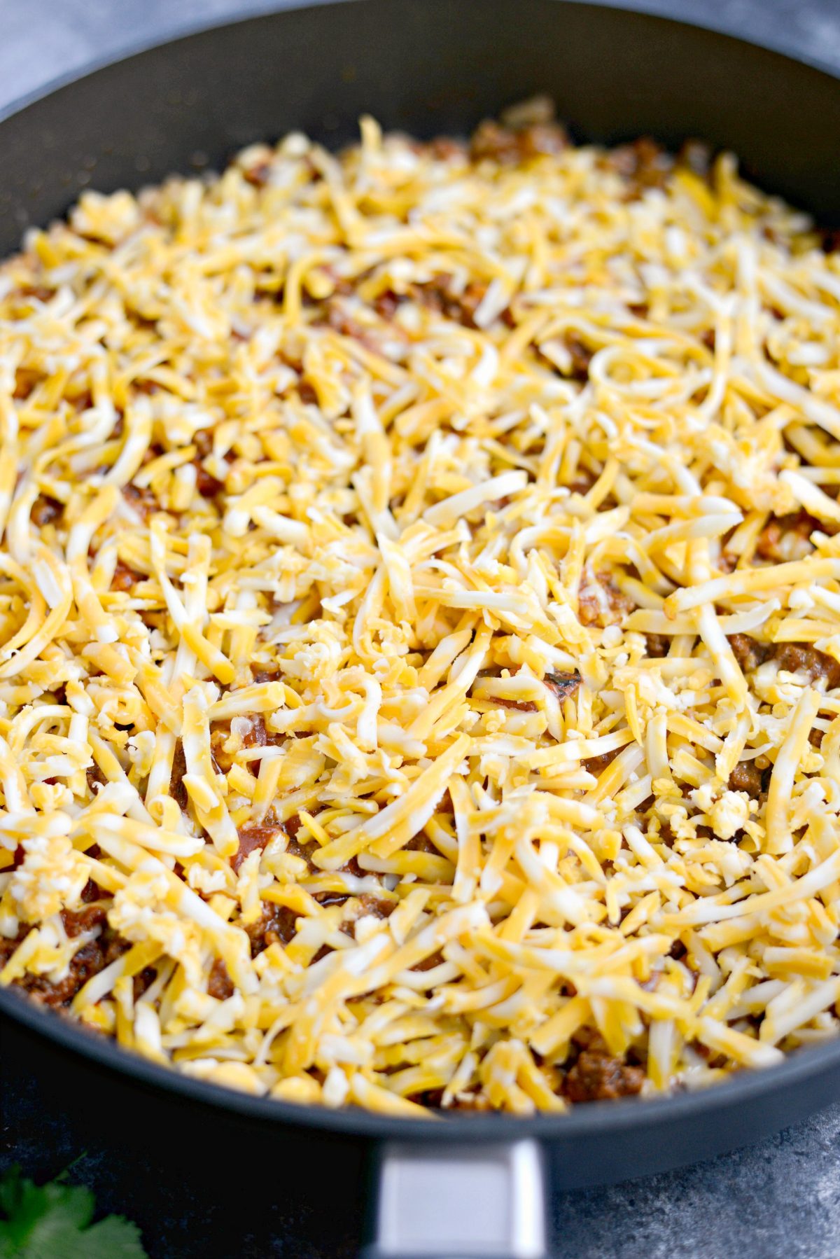 sprinkle with shredded cheese.