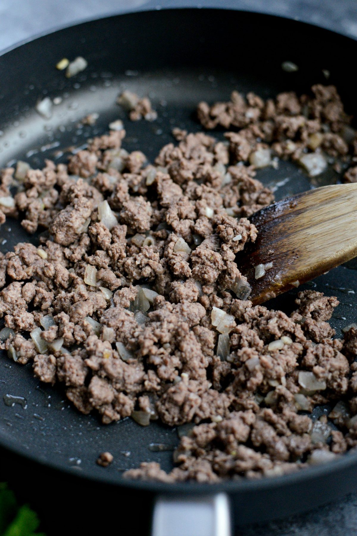 cooked ground beef in skillet