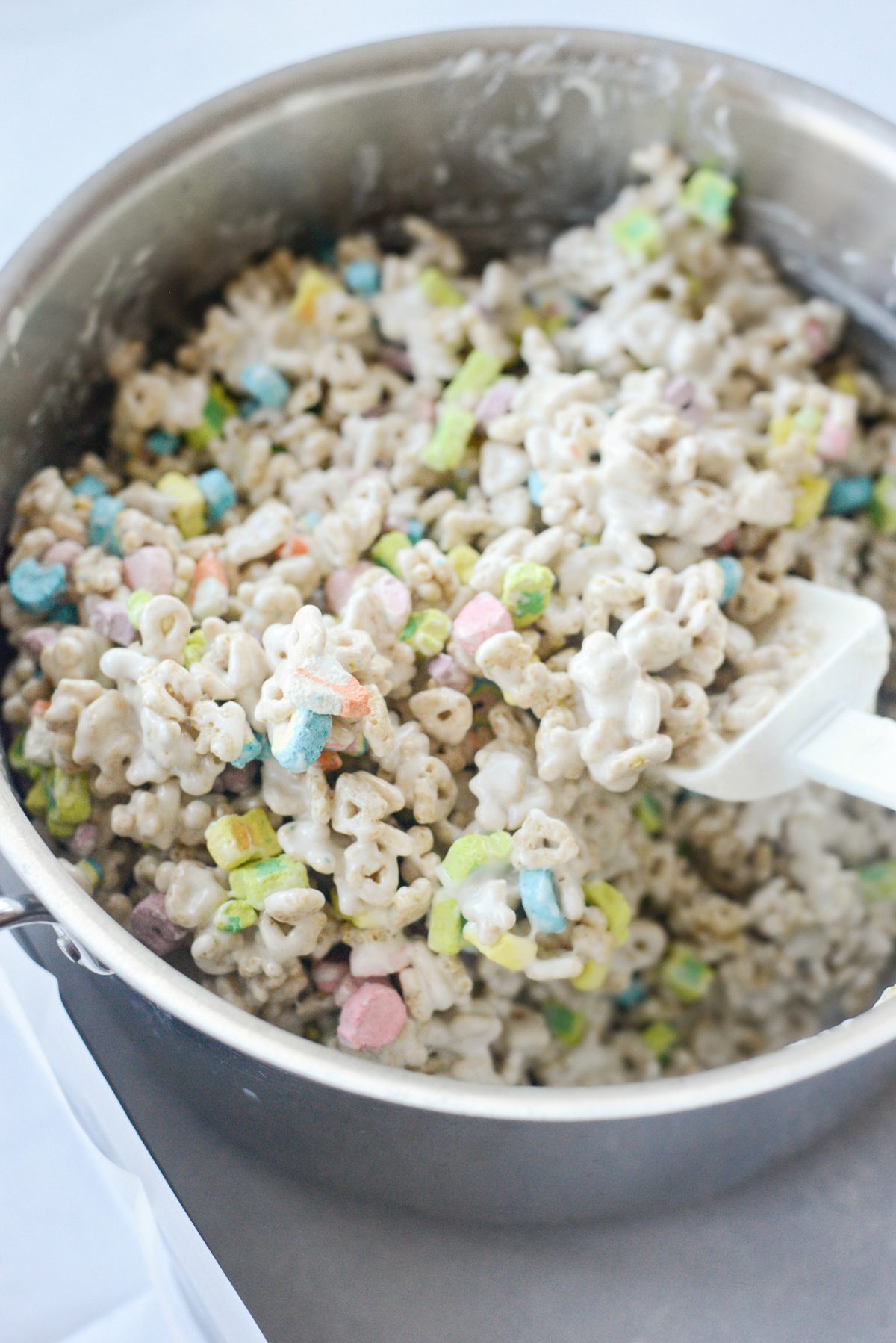 lucky charms marshmallows mixed in with the cereal and marshmallow mixture.