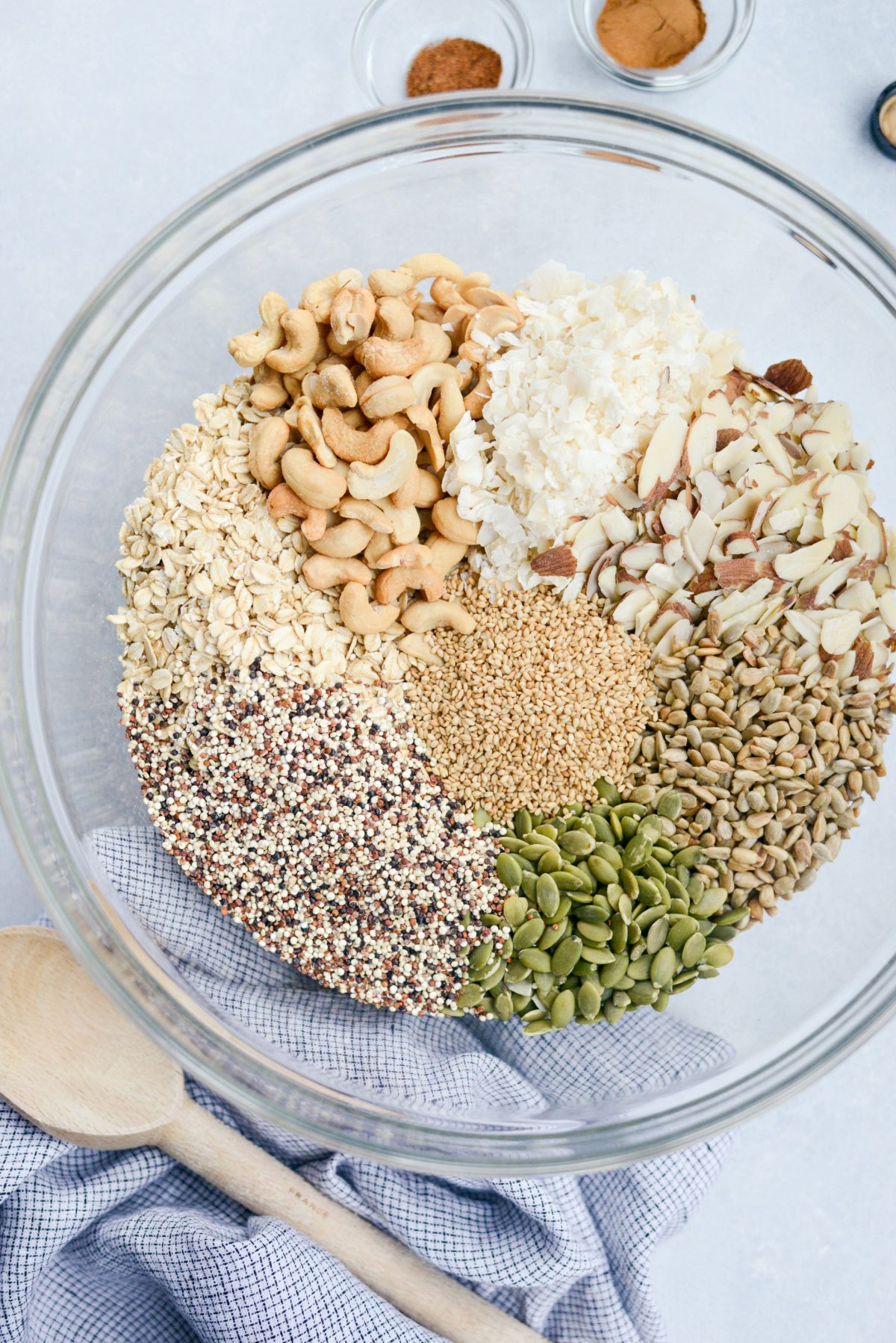 add oats, nuts and seeds to bowl.