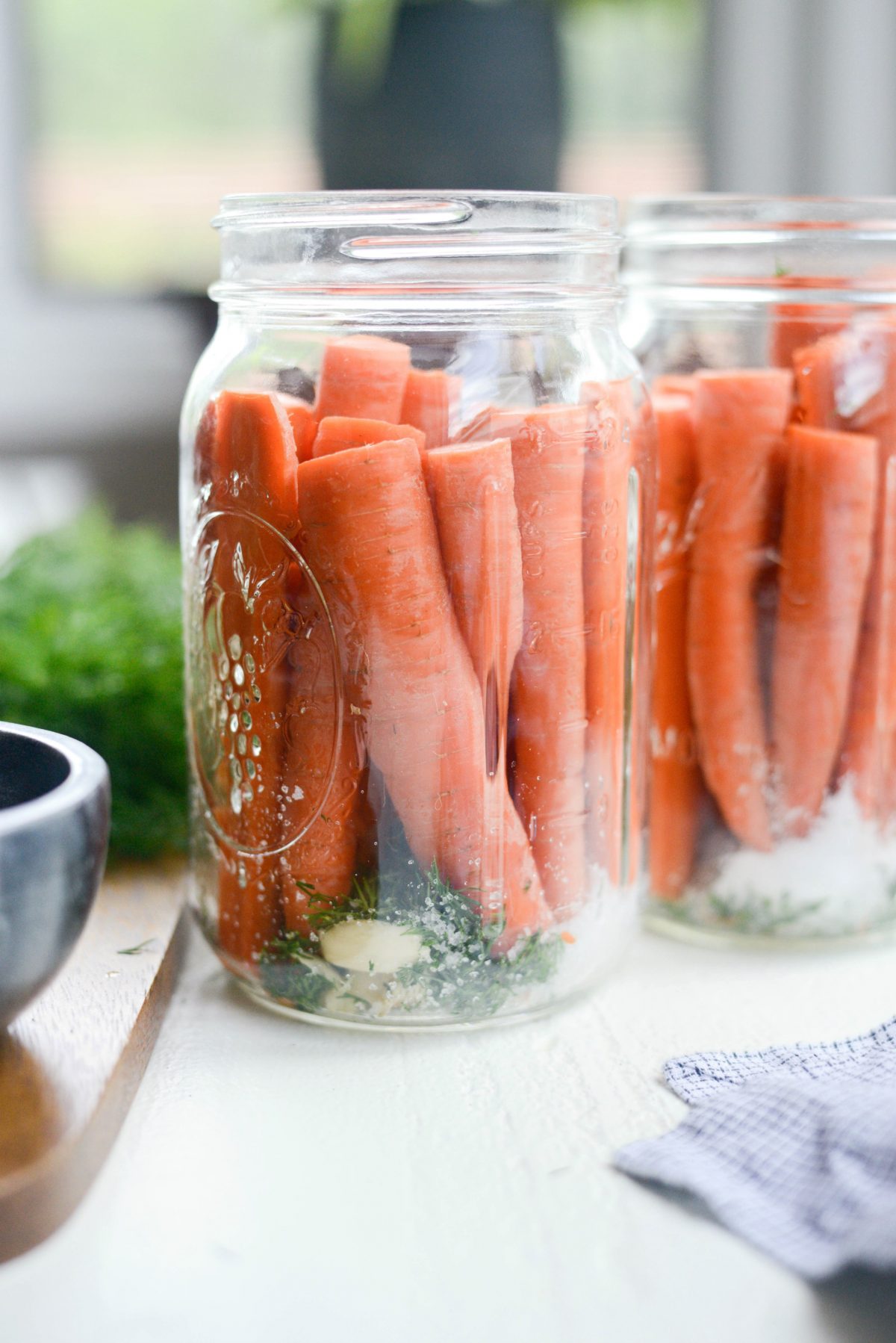 side of jars with carrots