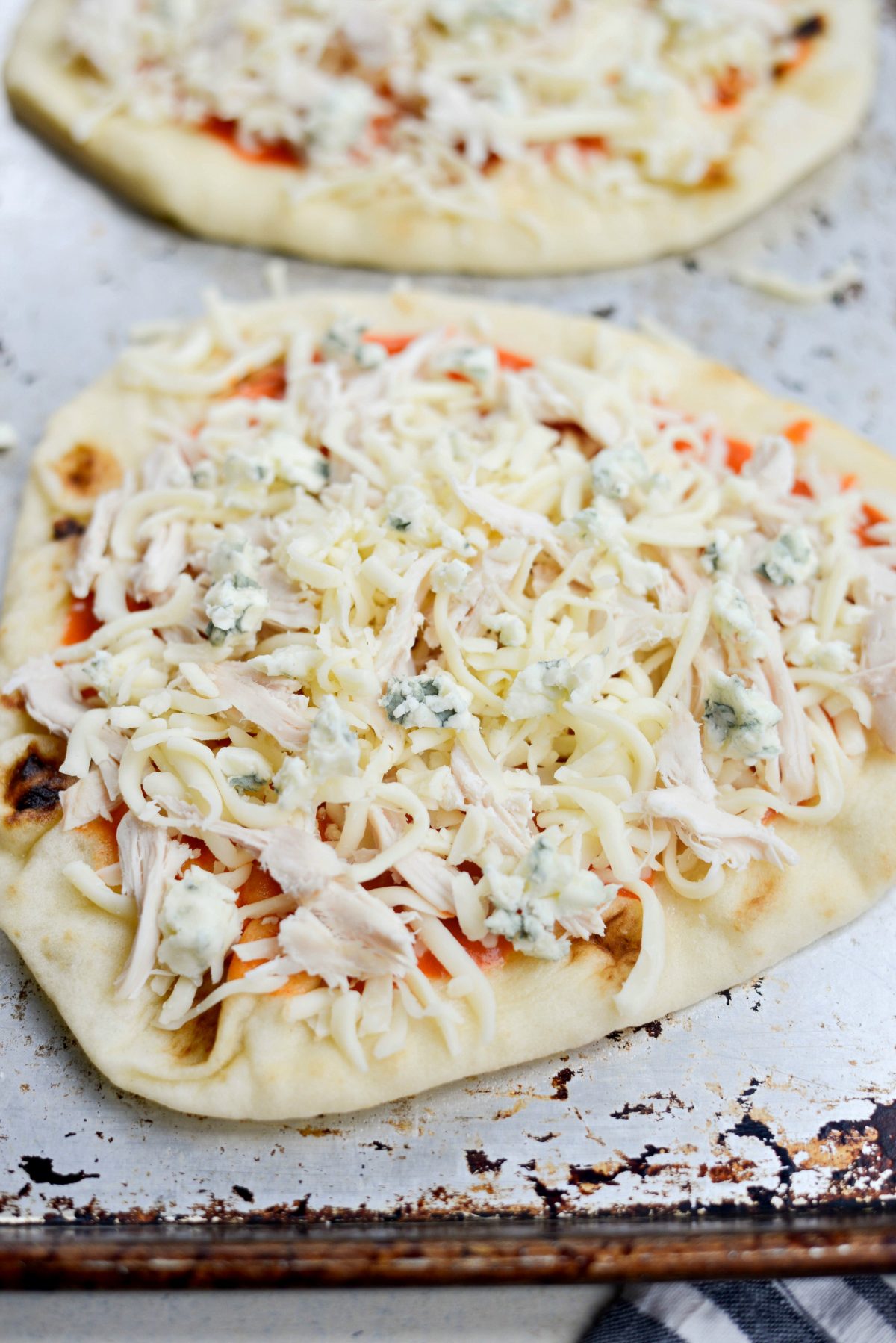 naan with buffalo sauce, cheese and chicken.