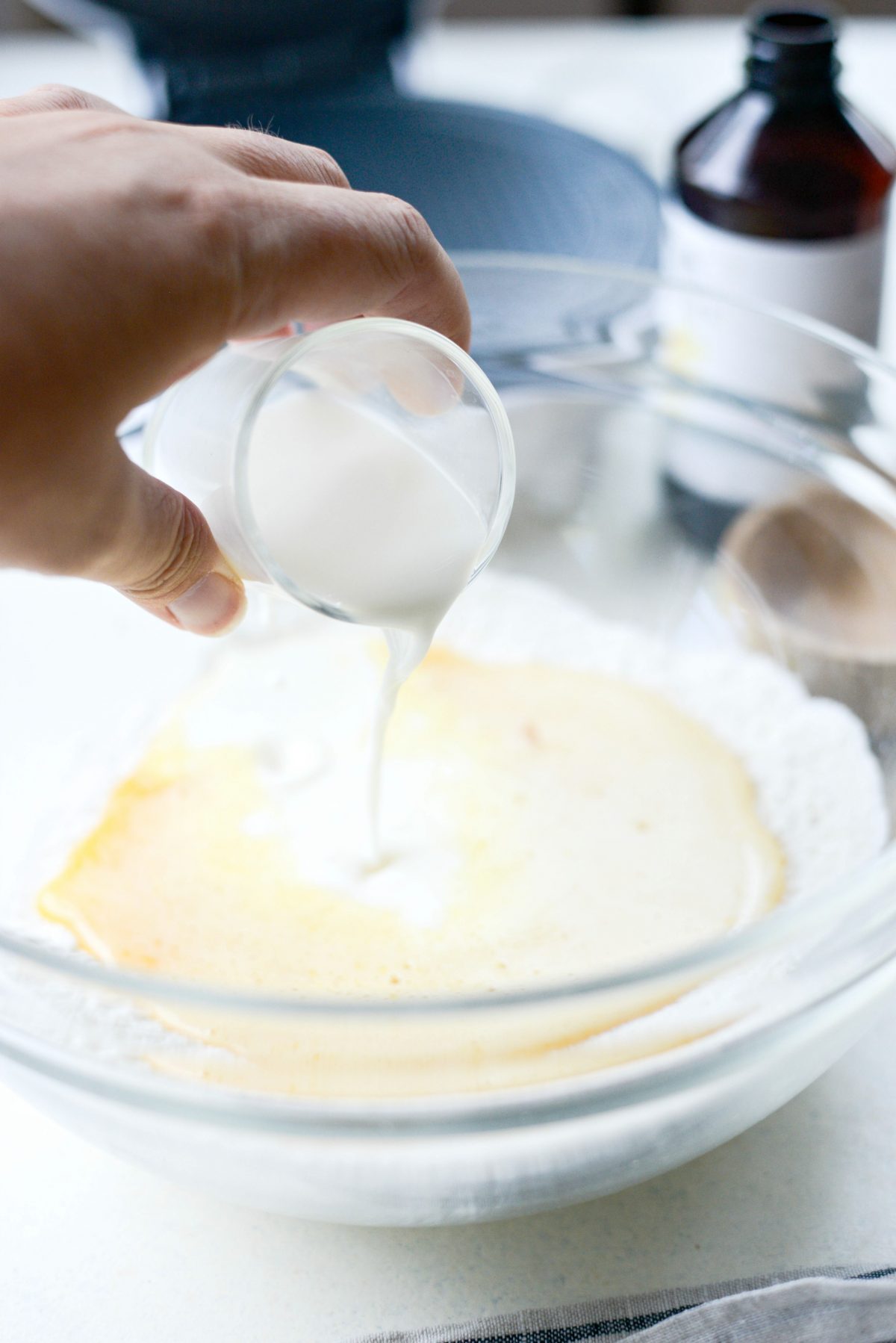 pouring in milk.