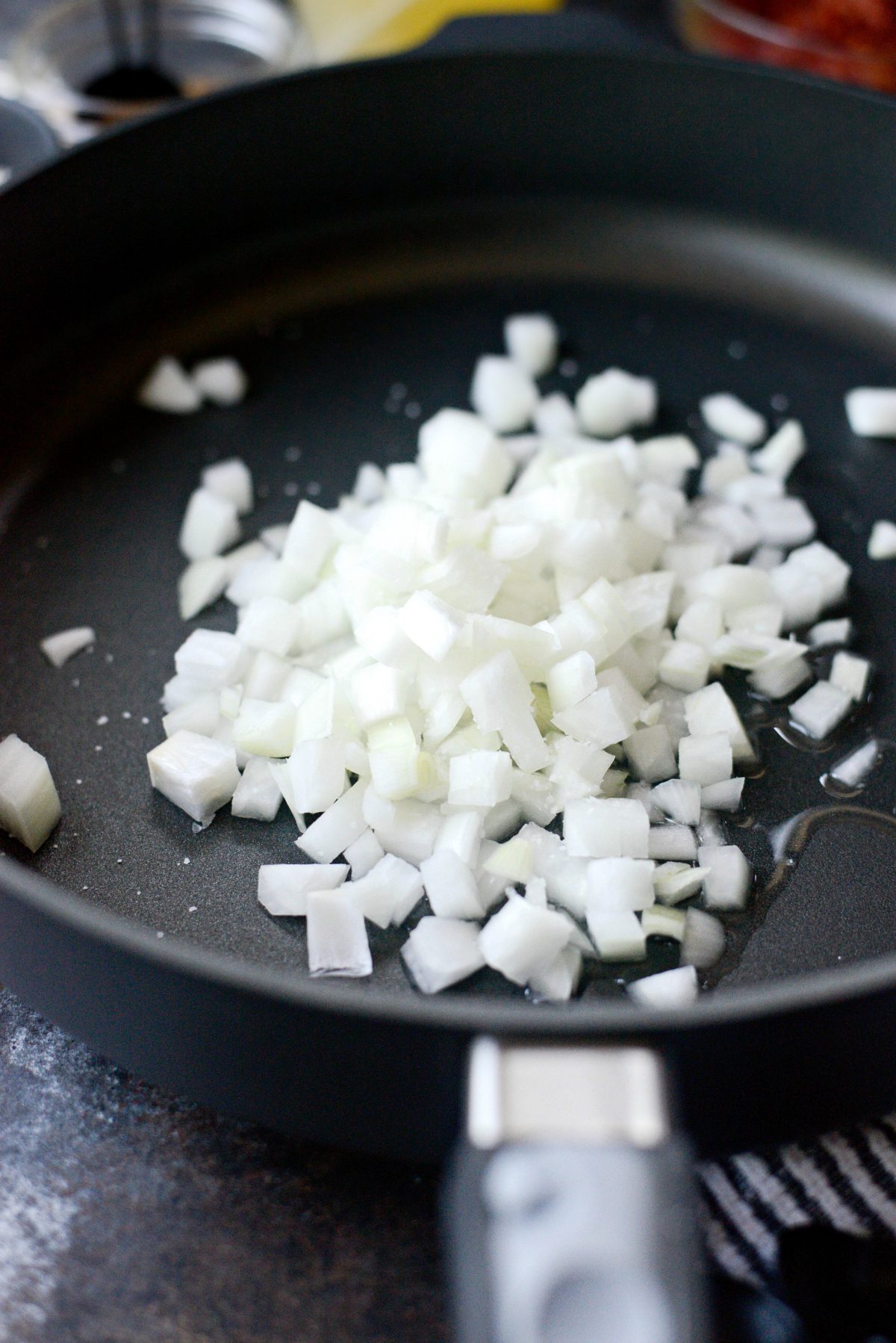add oil, onion and salt to a large skillet
