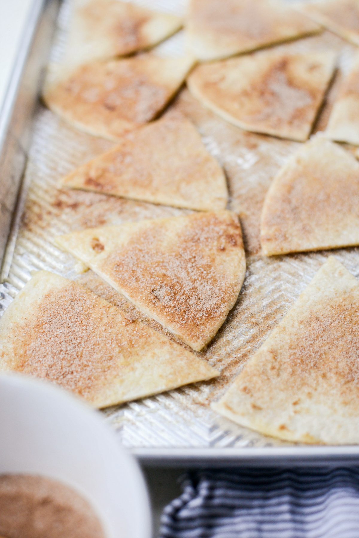 sprinkle buttered tortillas with cinnamon sugar