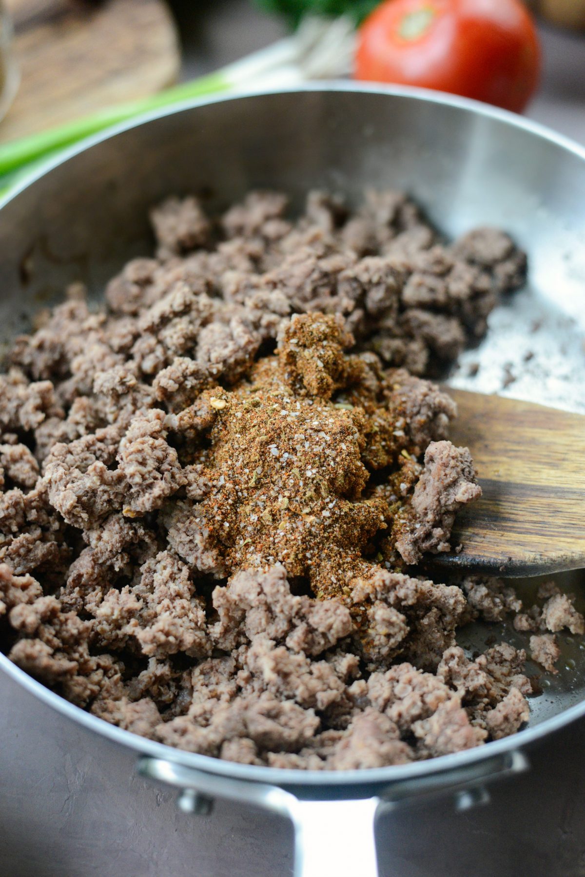 cooked ground beef with seasoning added