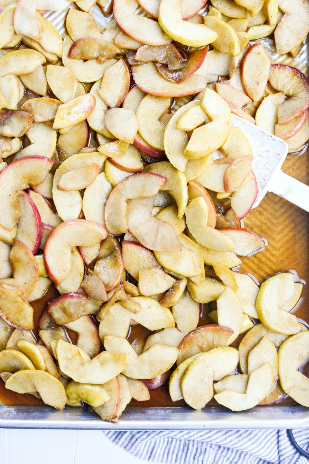 transfer apples to a rimmed metal baking sheet