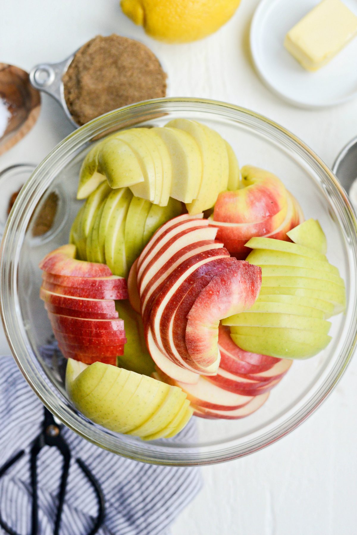 sliced unpeeled apples in a bowl