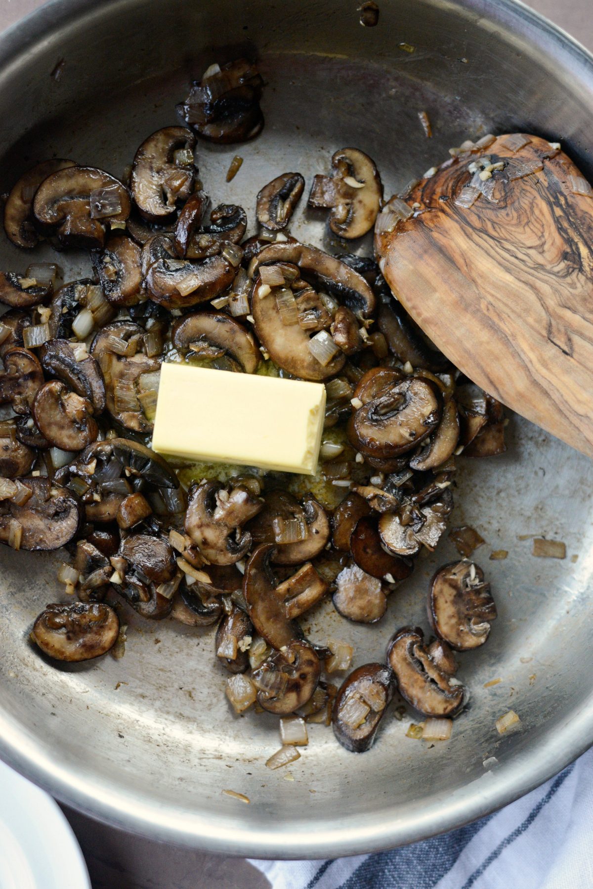 add more butter to mushrooms