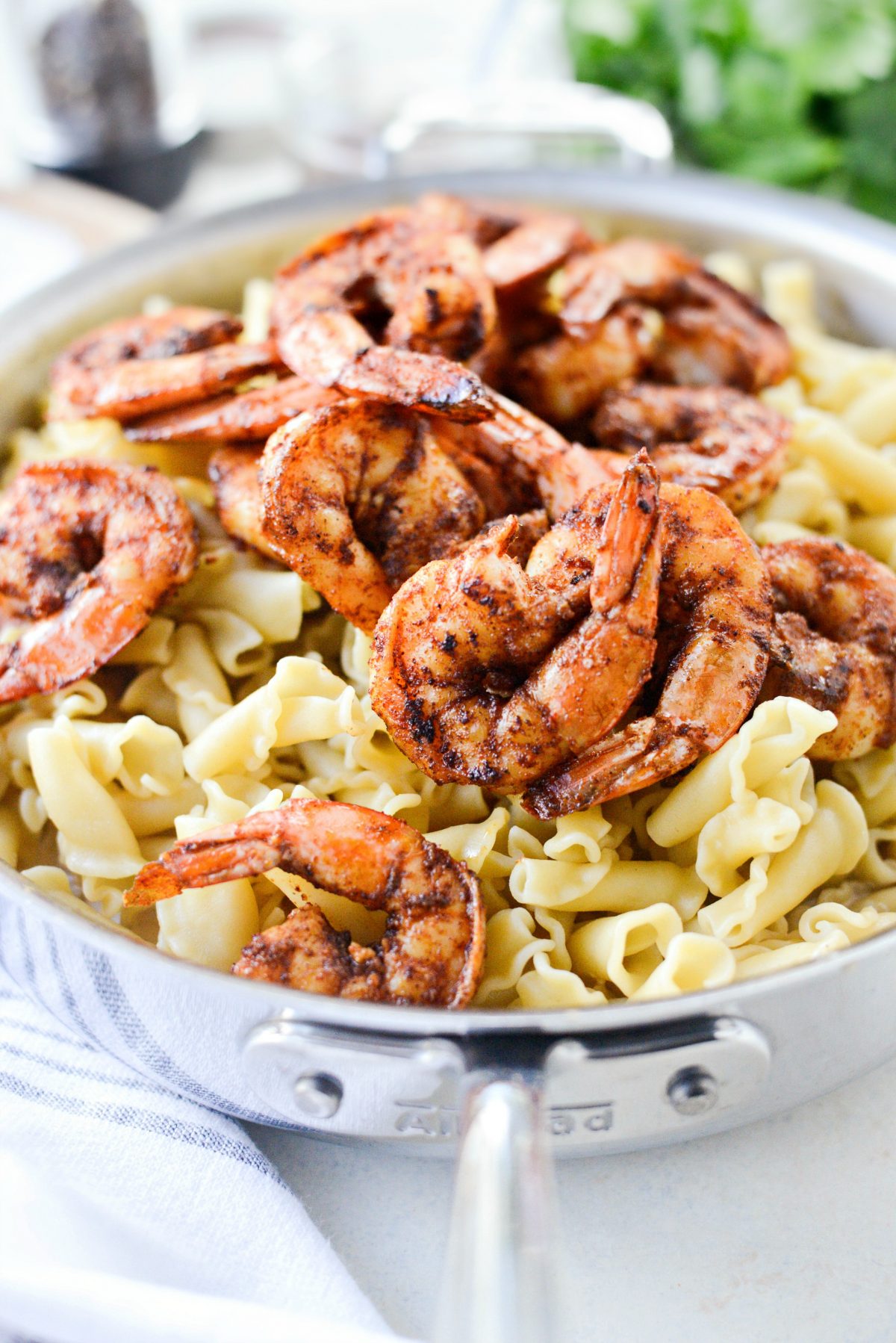 add in cooked pasta and shrimp.