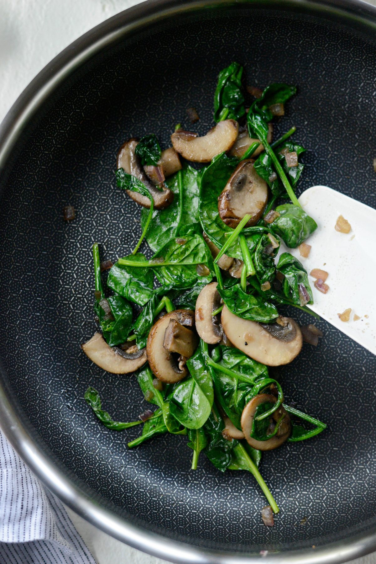 cook until the spinach is bright green and wilted