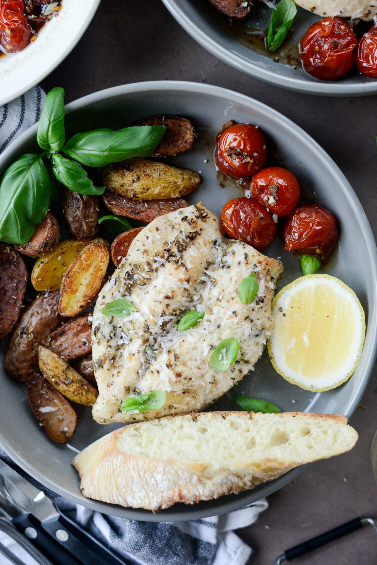 Tuscan Chicken and Potato Sheet Pan Dinner with Balsamic Burst Tomatoes