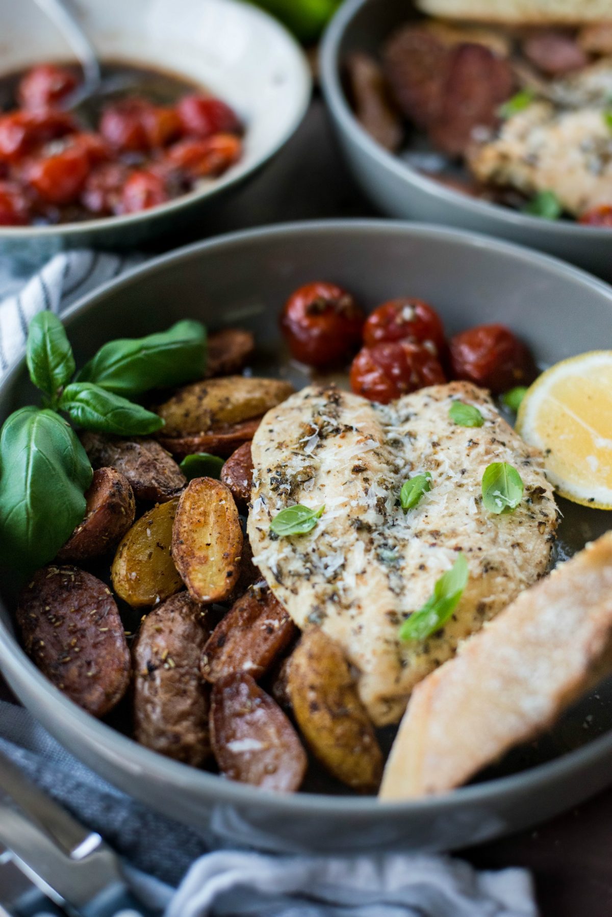 Tuscan Chicken and Potato Sheet Pan Dinner with Balsamic Burst Tomatoes 