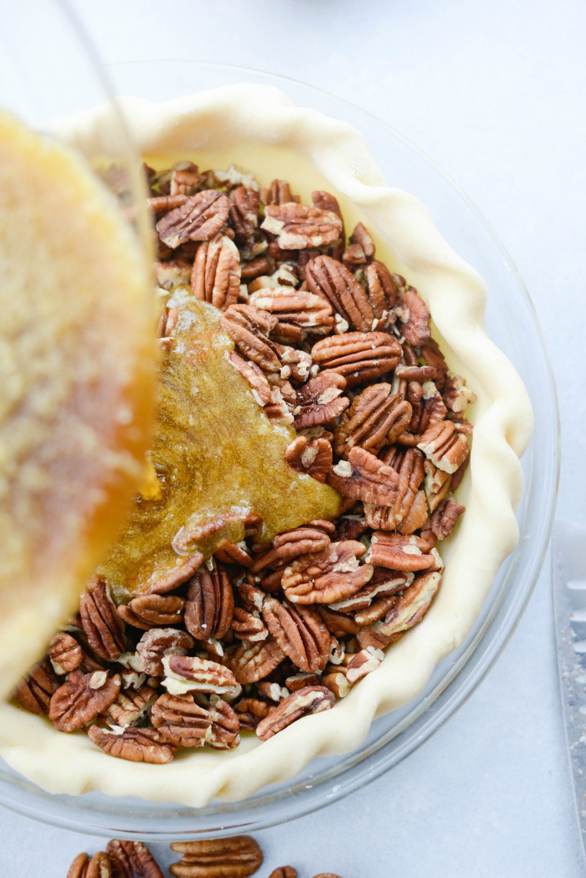 Pour the filling over top of the pecans