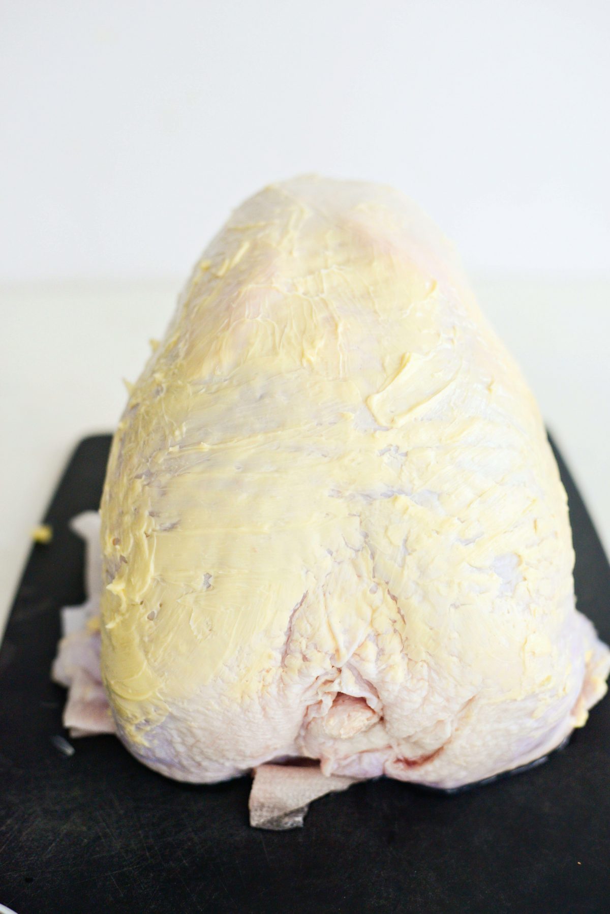 rub butter over outer skin of the turkey