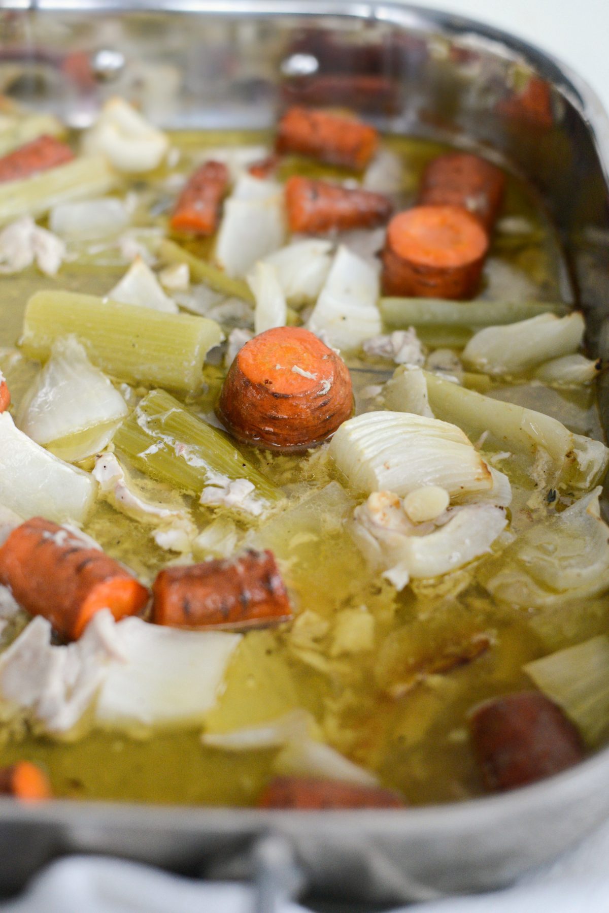 vegetables in roasting pan juices