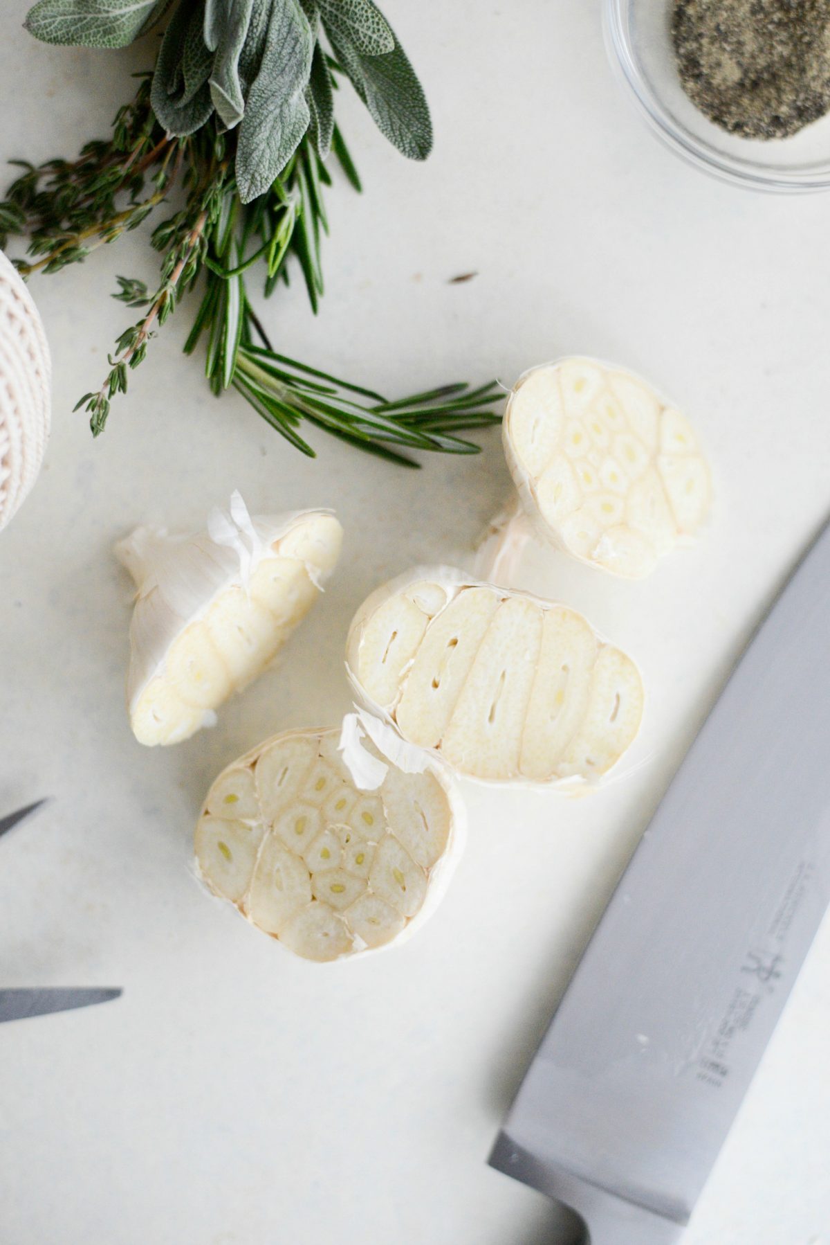 whole heads of garlic halved