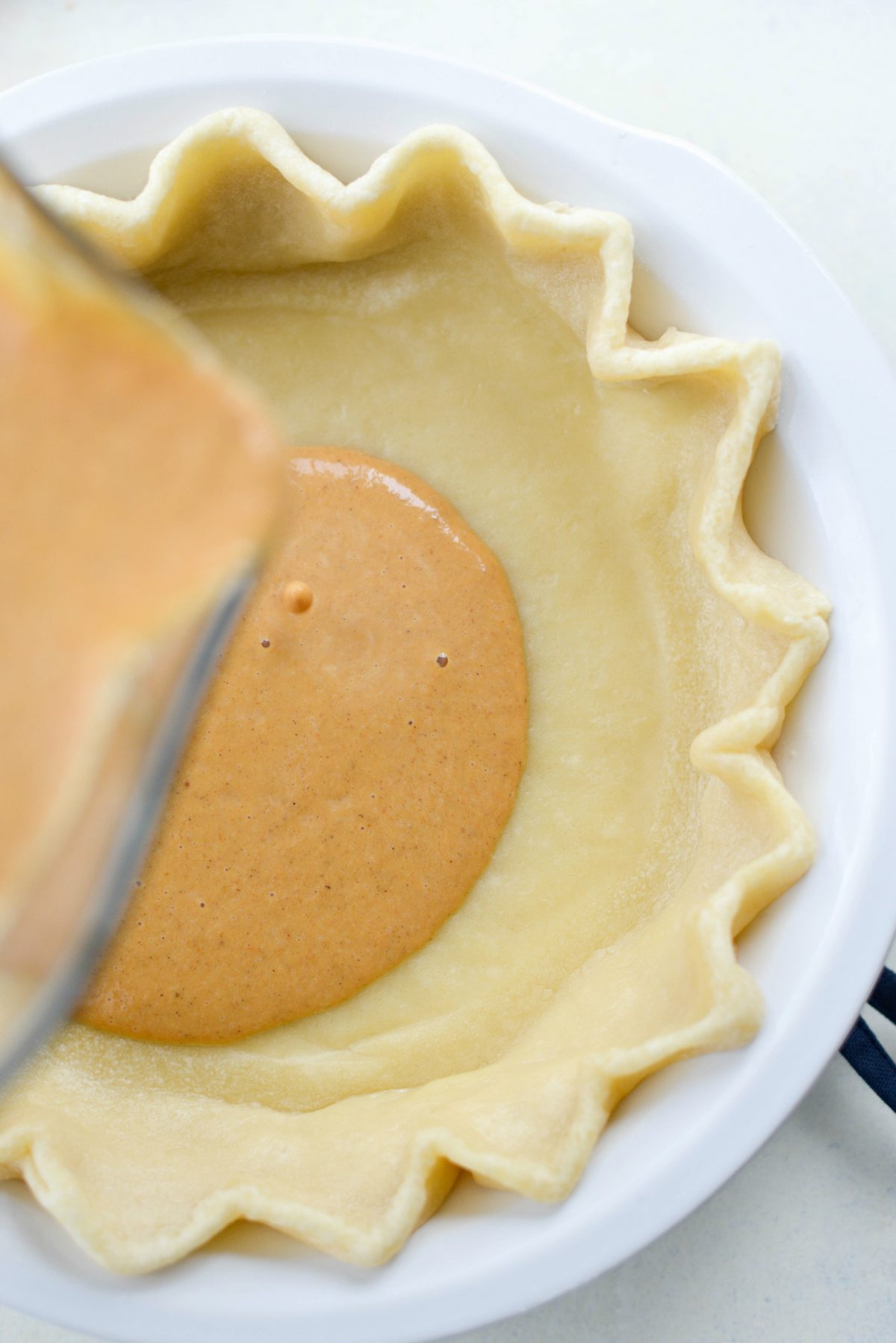 pour into partially baked pie crust.