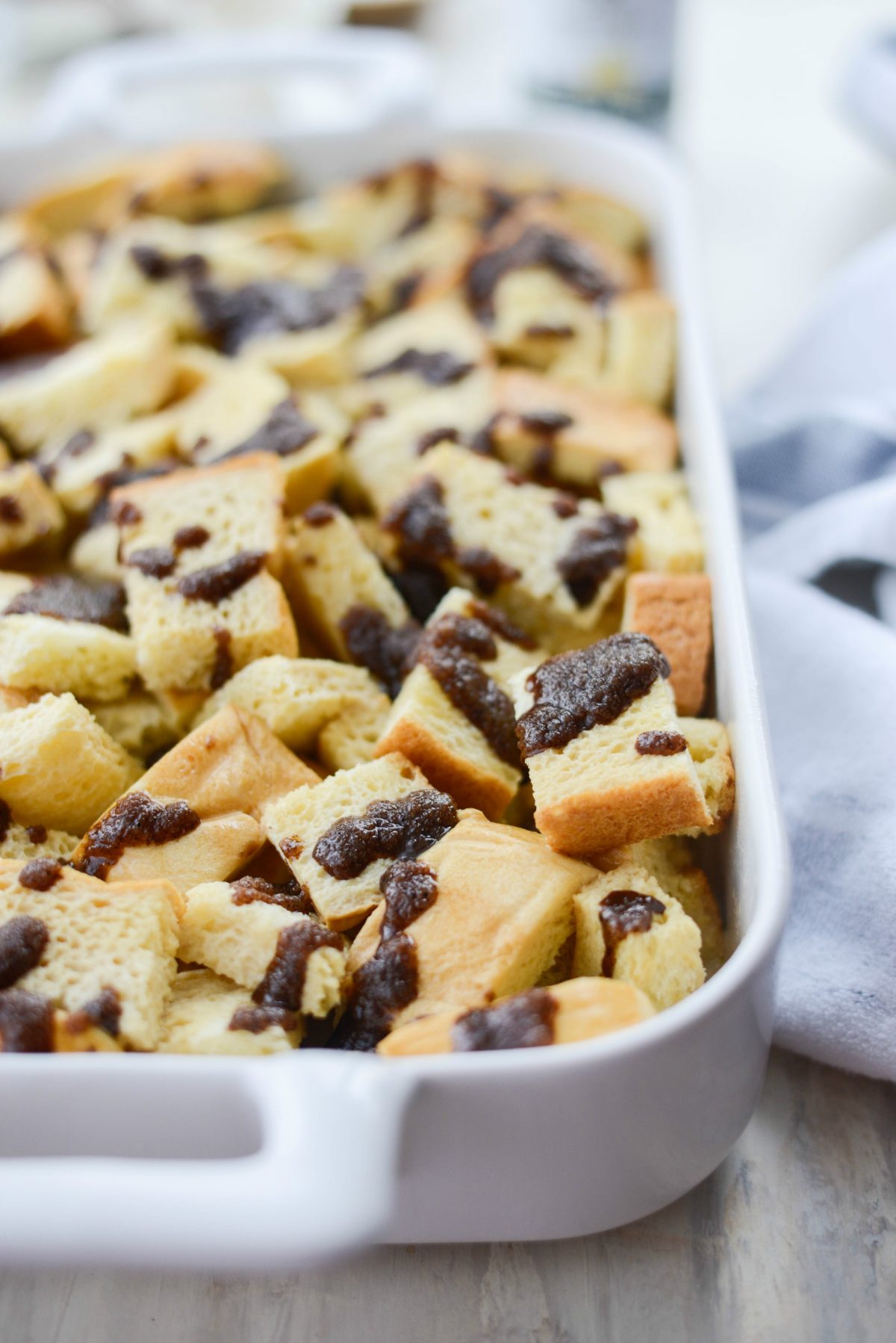 drizzle gingerbread mixture over top of soaked brioche