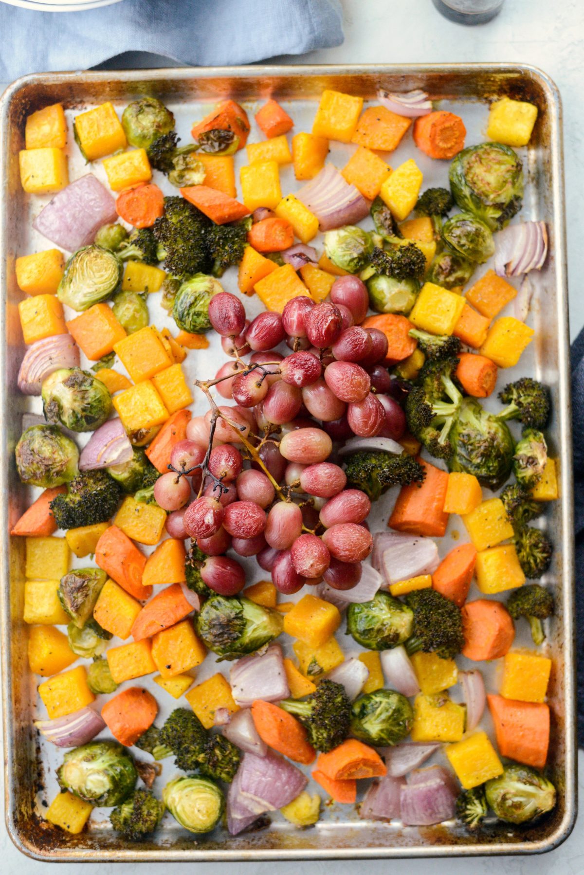 sheet pan of roasted veggies and grapes