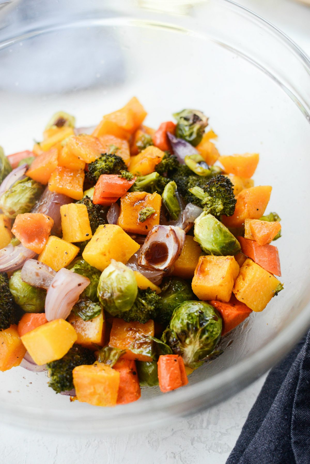 veggies back in a bowl and drizzled with balsamic vinegar and honey