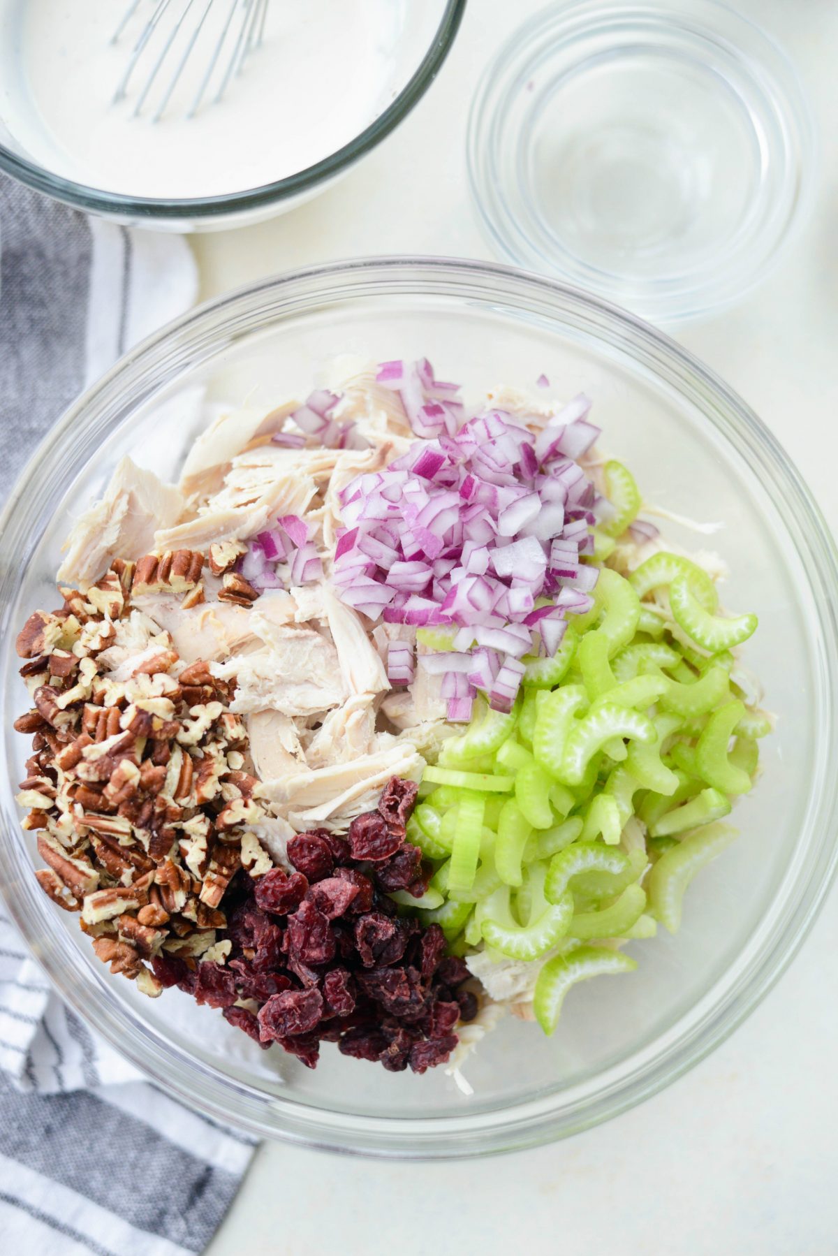 add turkey, toasted pecans, dried cranberries, red onion and celery to a bowl