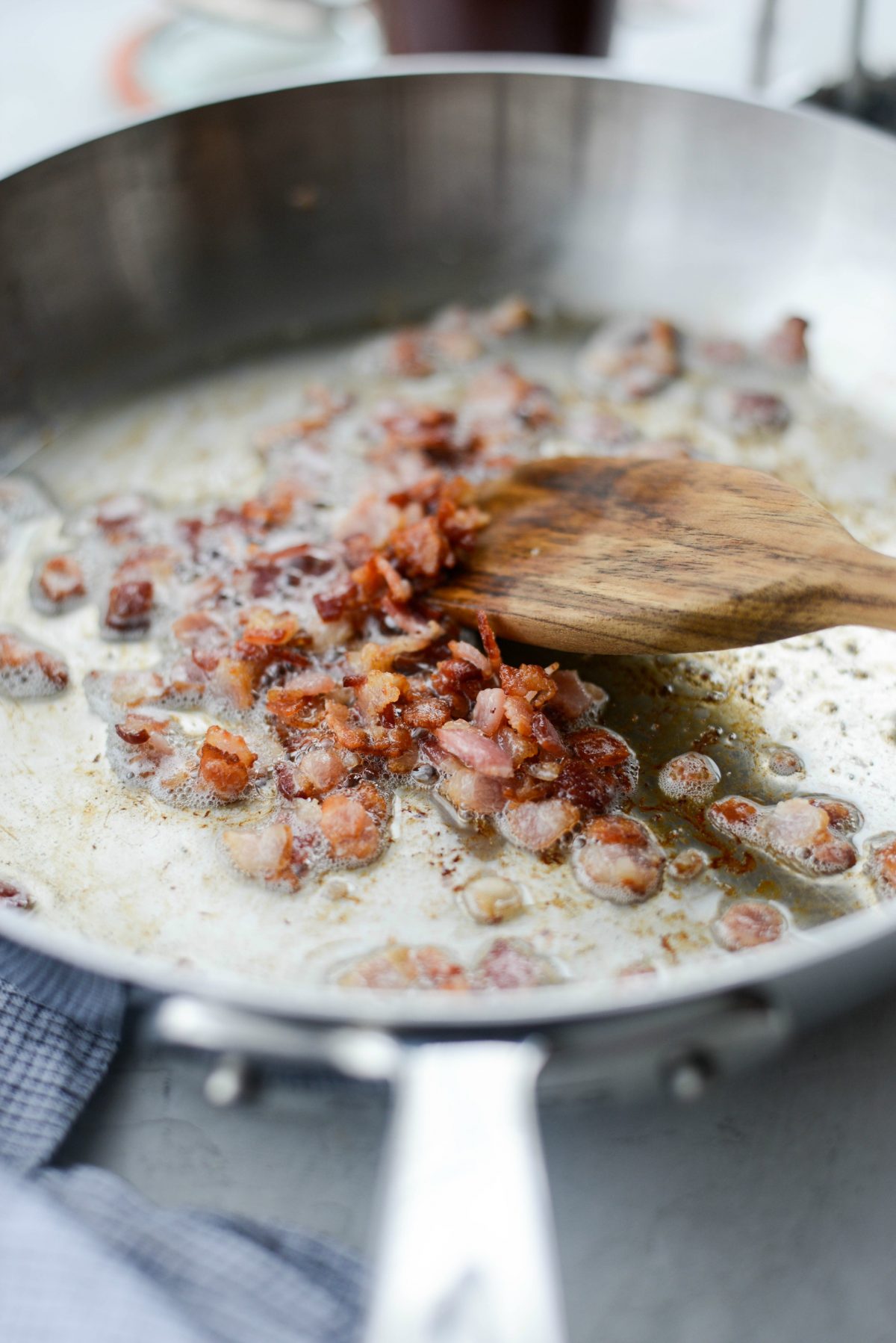 cook bacon pieces until crispy.