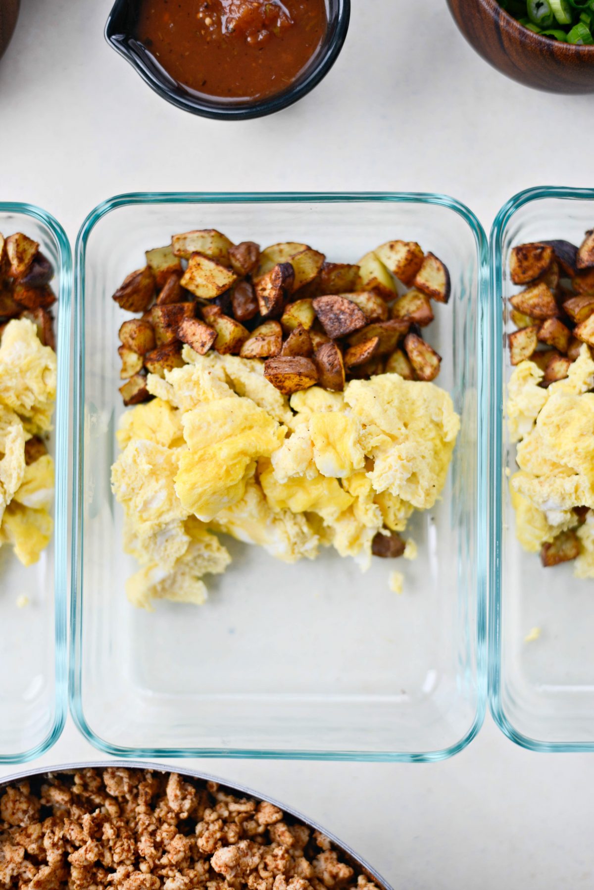 add eggs and roasted potatoes to storage containers