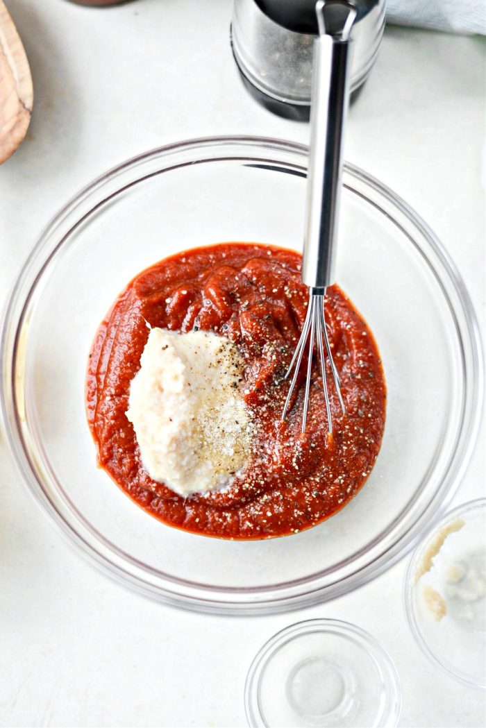 Add cocktail ingredients to bowl