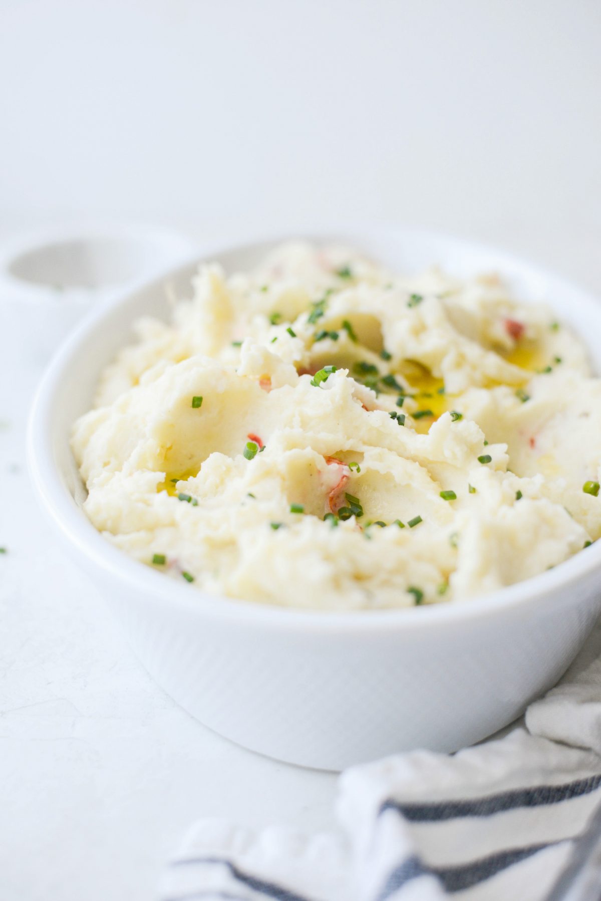 Lobster Mashed Potatoes with melted butter and snipped chives