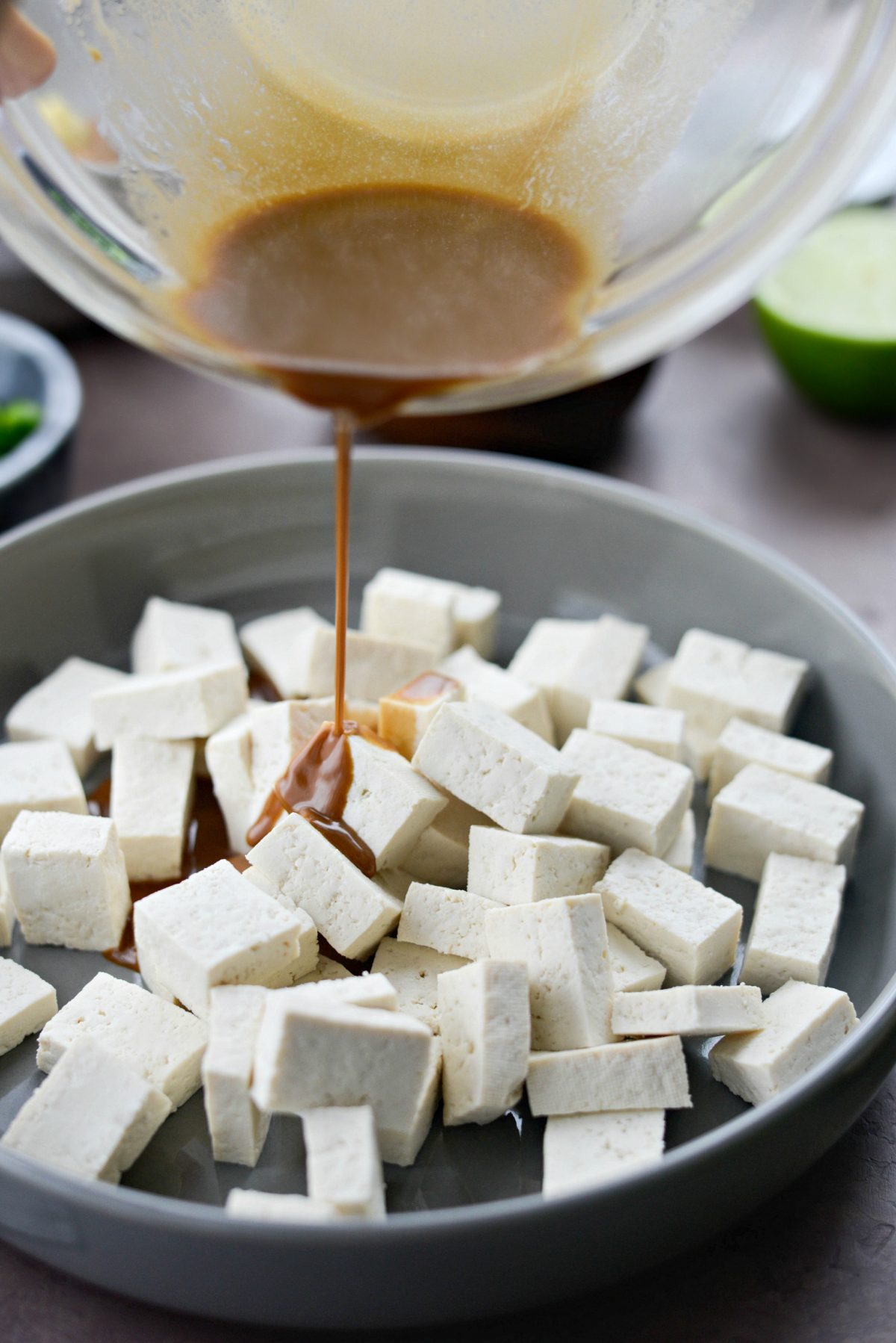 pour marinade over tofu