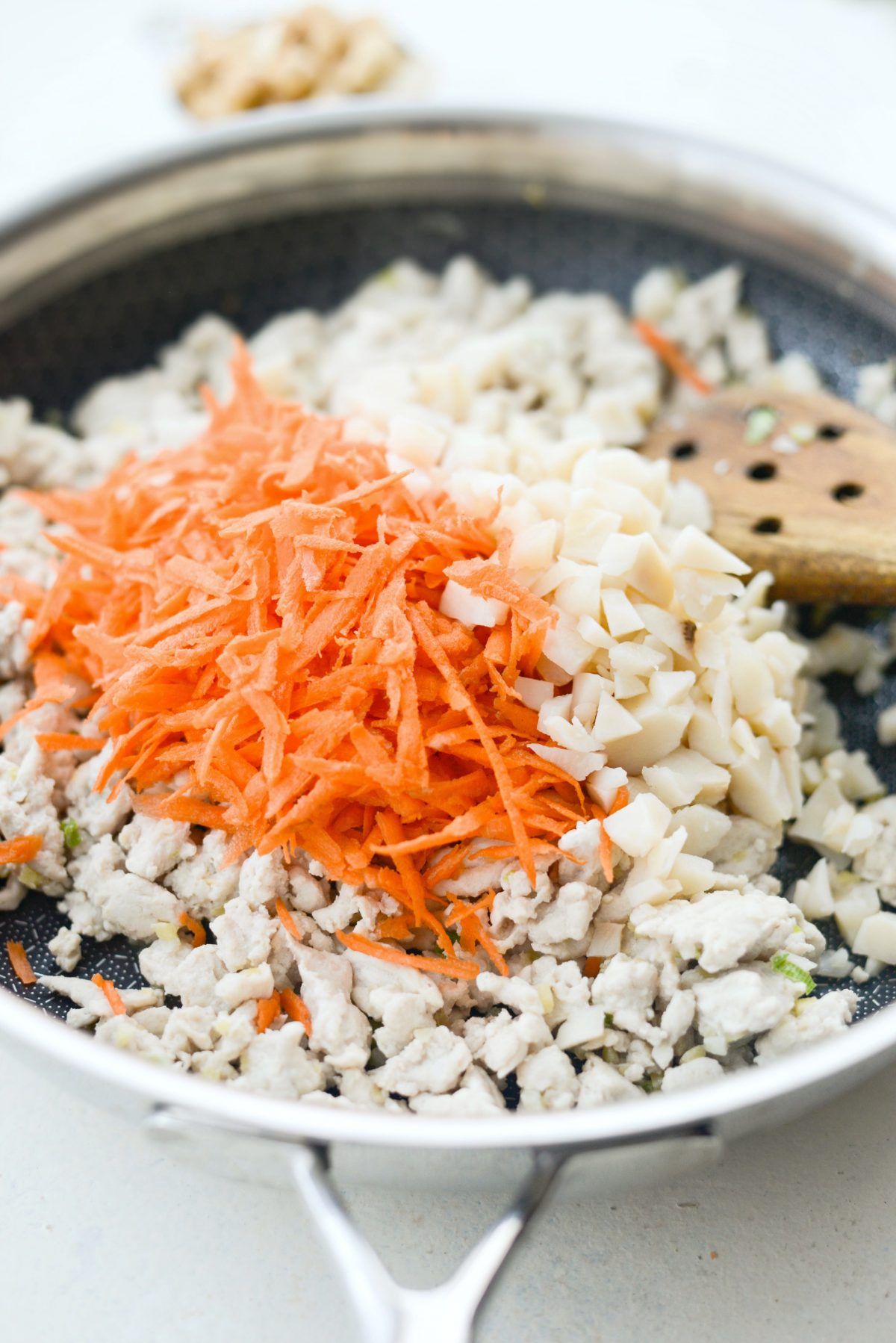 cooked ground turkey, shredded carrot and chopped water chestnuts