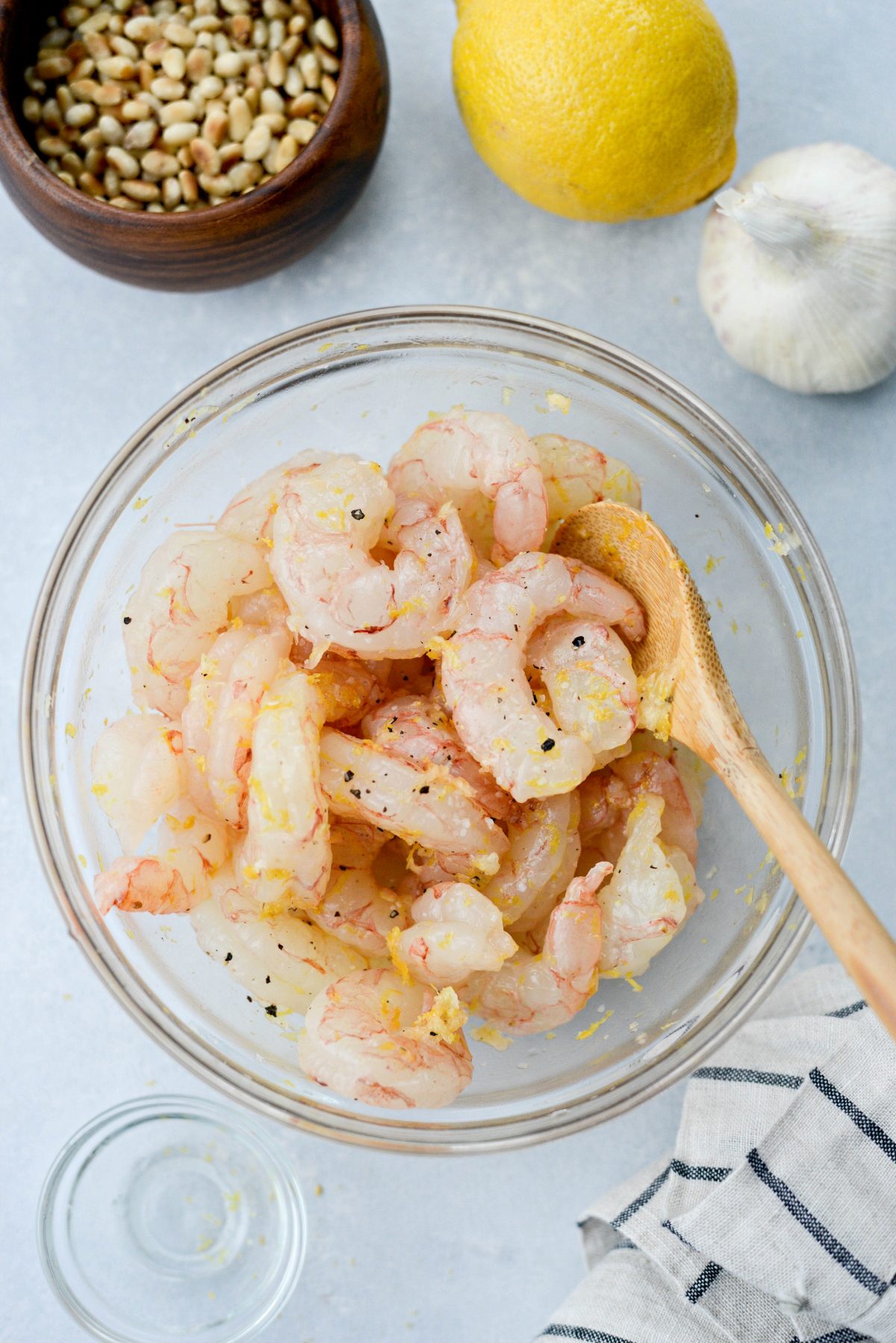 toss shrimp with oil, garlic, lemon zest and salt and pepper