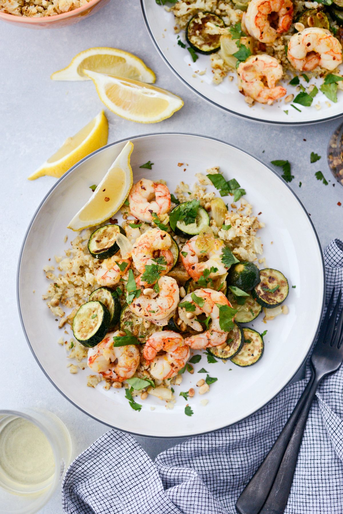 Sheet Pan Lemon Garlic Shrimp and Zucchini in white bowl