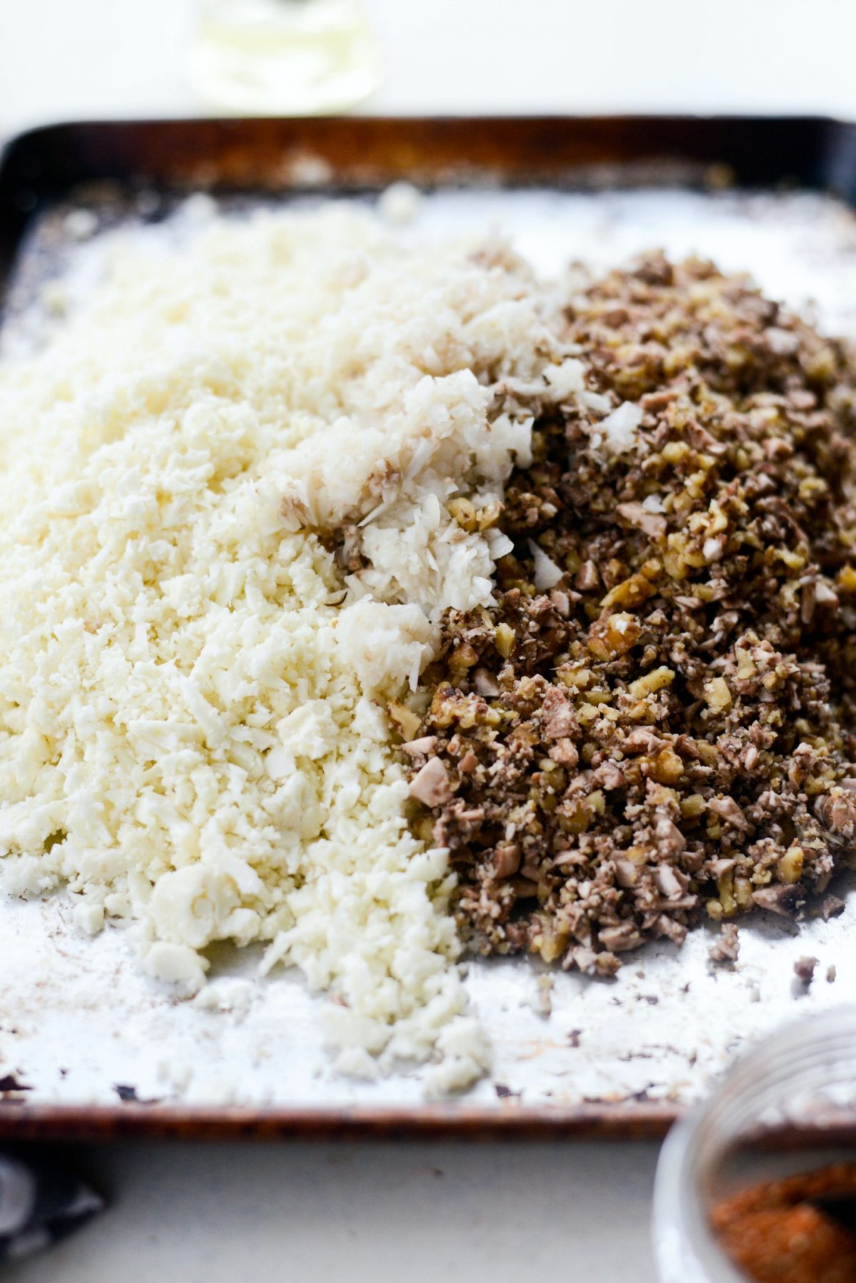 sheet pan with mushroom and walnut mixture, cauliflower rice and minced onion