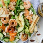 Grilled Asian Shrimp Salad with Crispy Wontons l SimplyScratch.com #shrimp #asian #salad #crispy #wonton #mandarin #oranges #toastedsesame #dressing #avocado